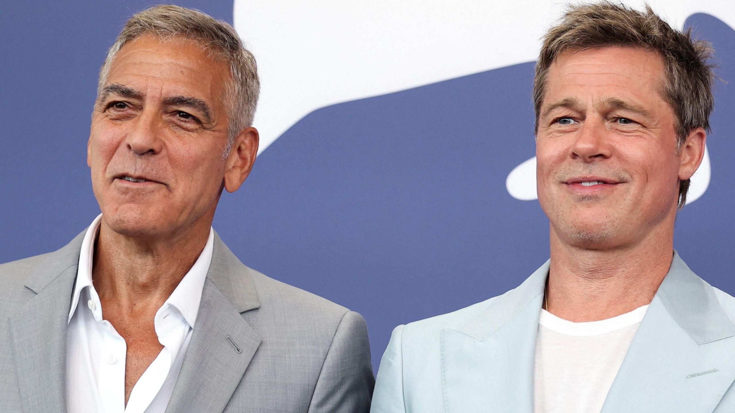 Cast members Brad Pitt and George Clooney pose during a photocall for the movie "The Wolfs" out of competition, at the 81st Venice Film Festival, Venice, Italy, September 1, 2024