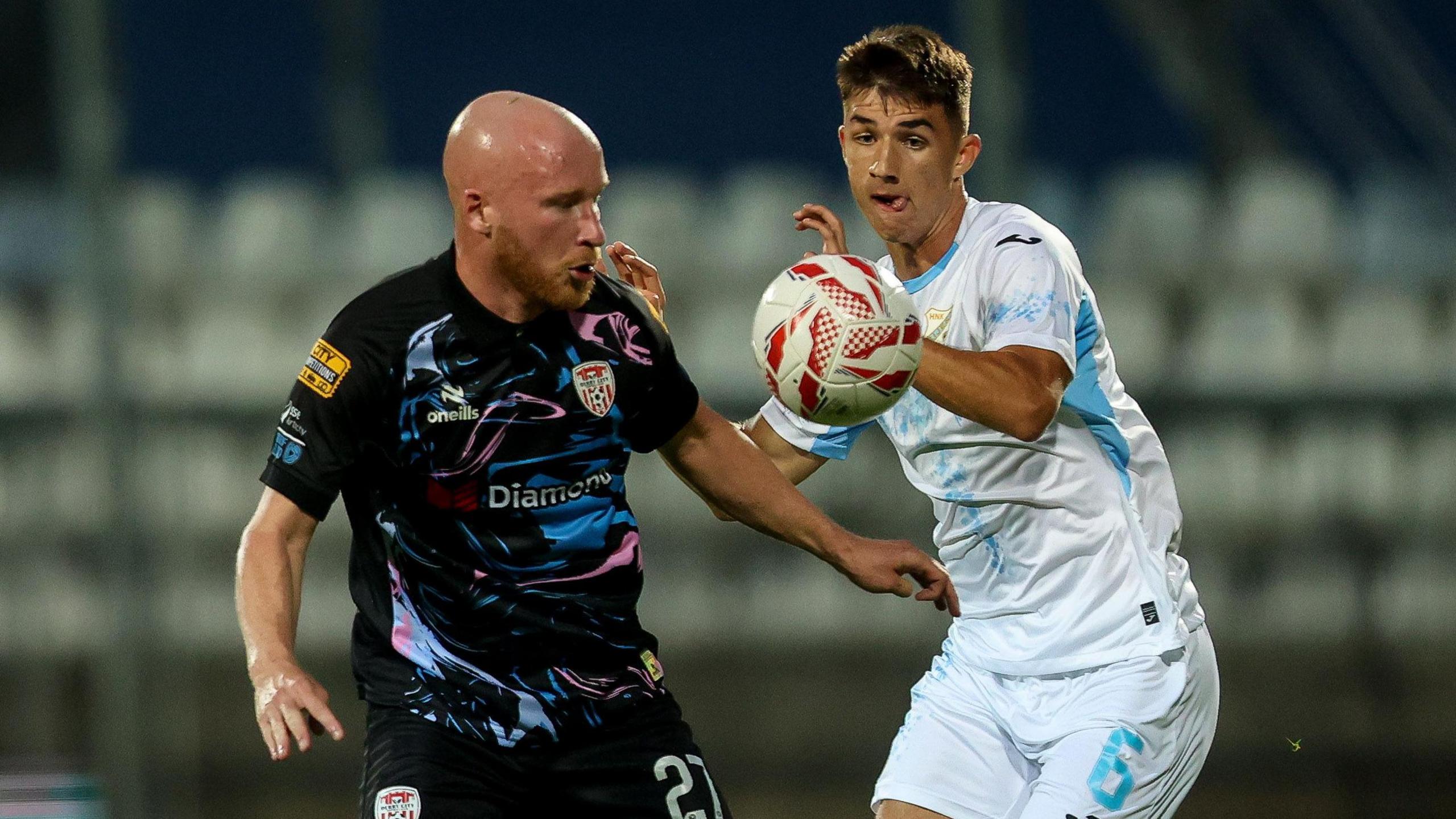 Liam Boyce with Rijeka's Branko Pavić
