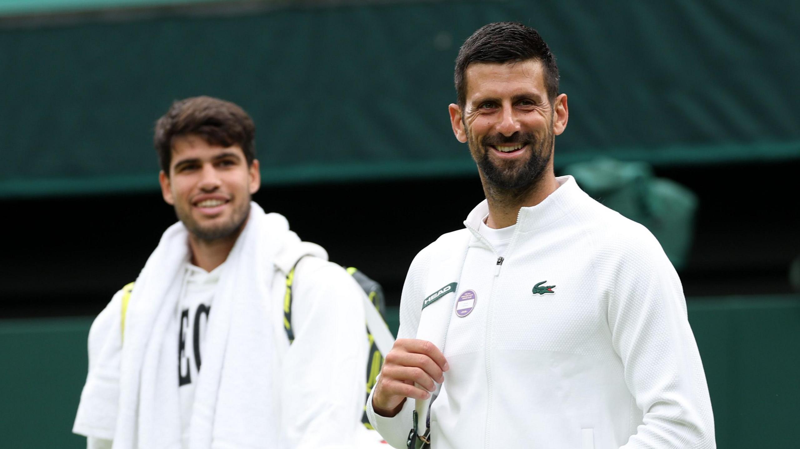 Carlos Alcaraz and Novak Djokovic walk onto Centre Court together