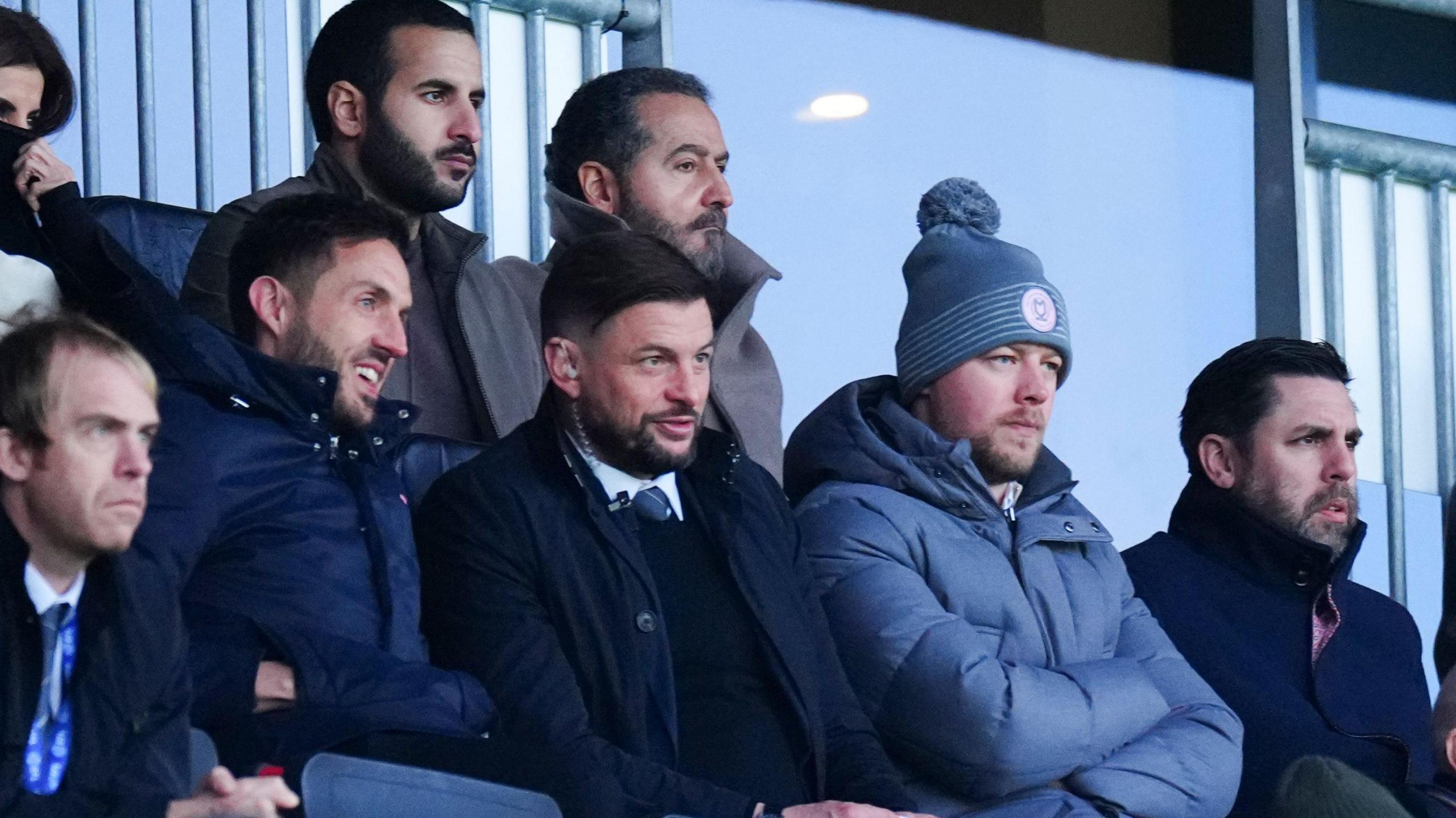 Neil Hart (right) in the chairman's box at Stadium MK