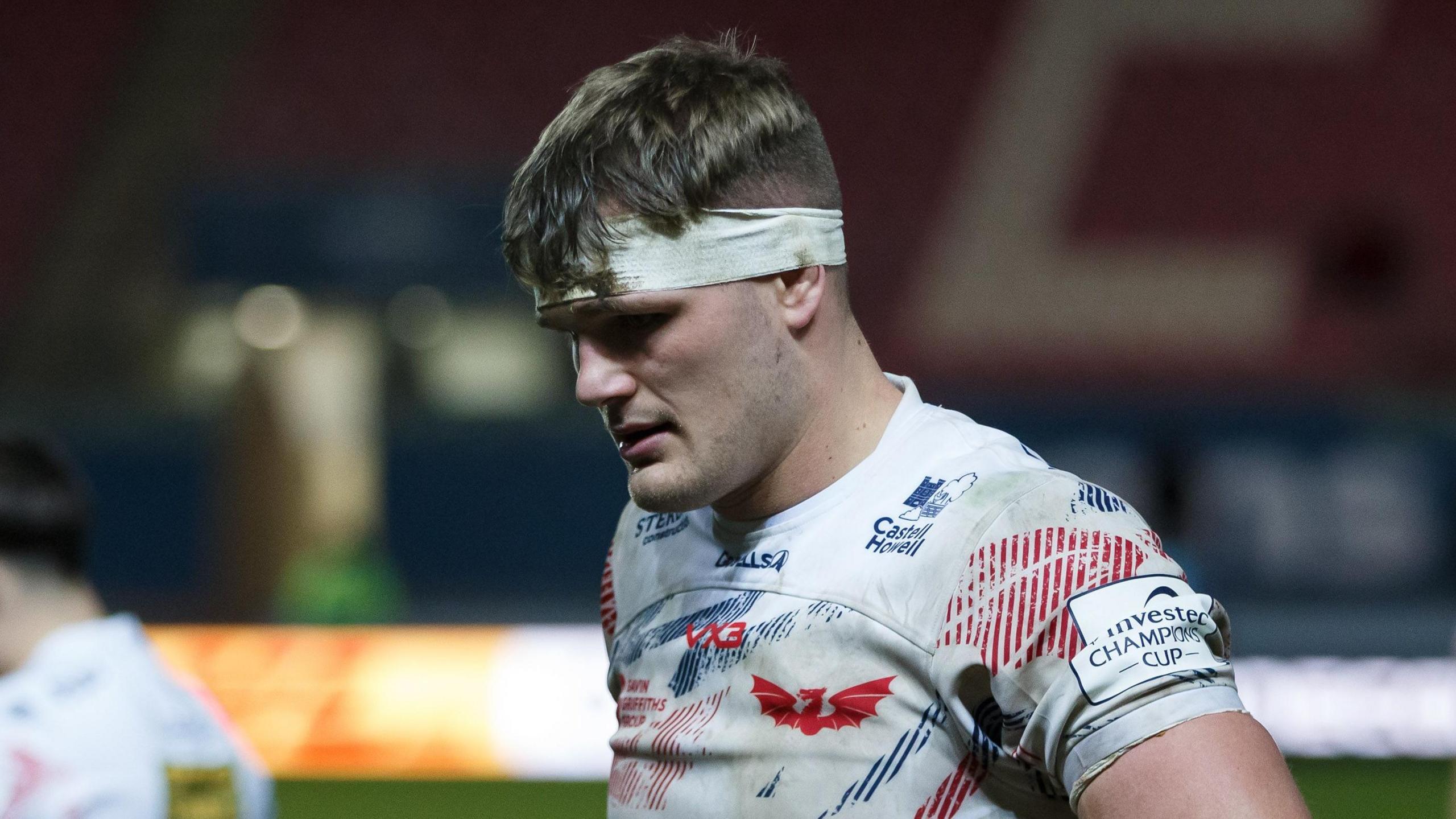 Taine Plumtree is dejected after Scarlets' defeat by Pau in the Champions Cup
