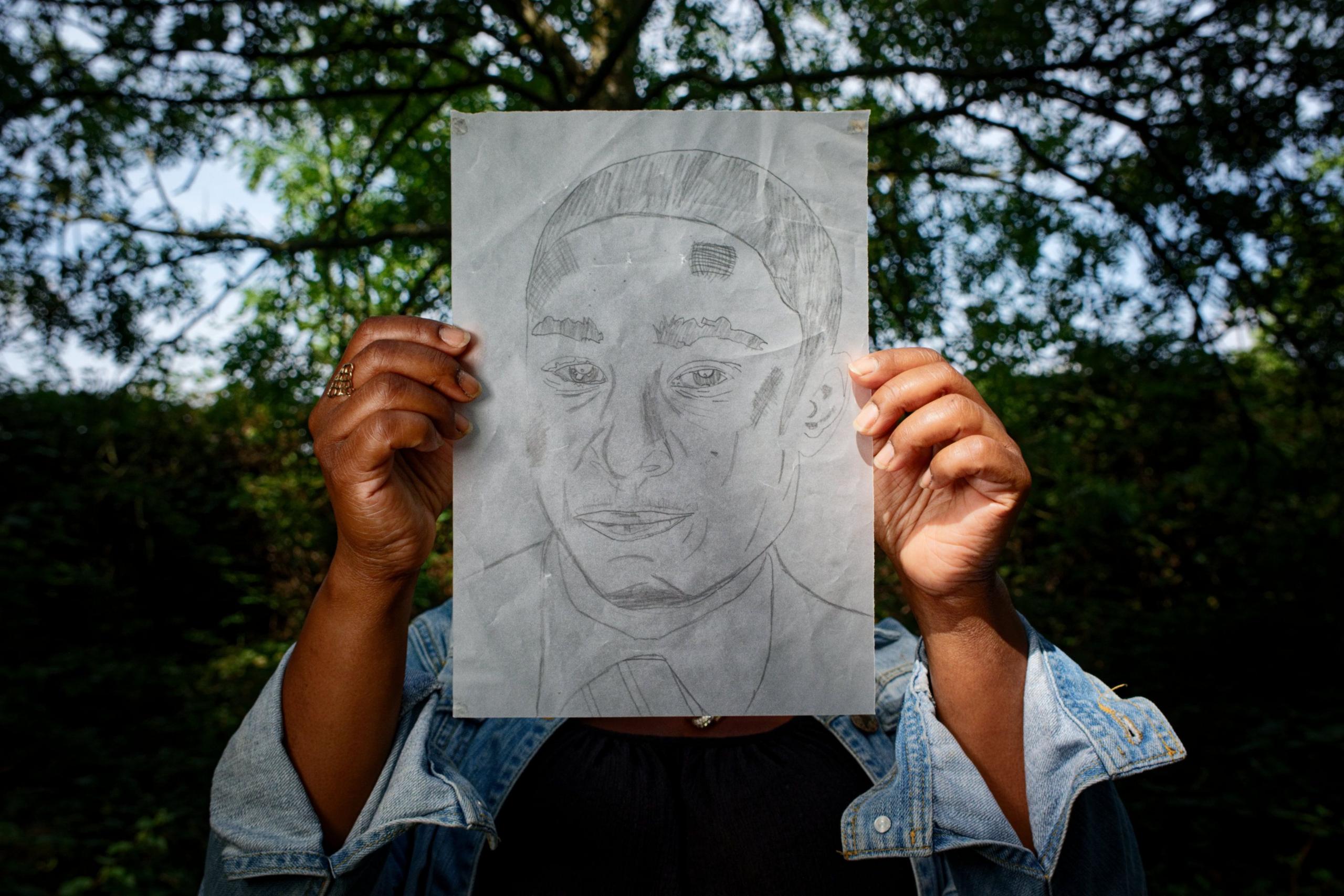 Sketch held by his mother of Jovanni Peddie who died in 2011 after falling from a tower block