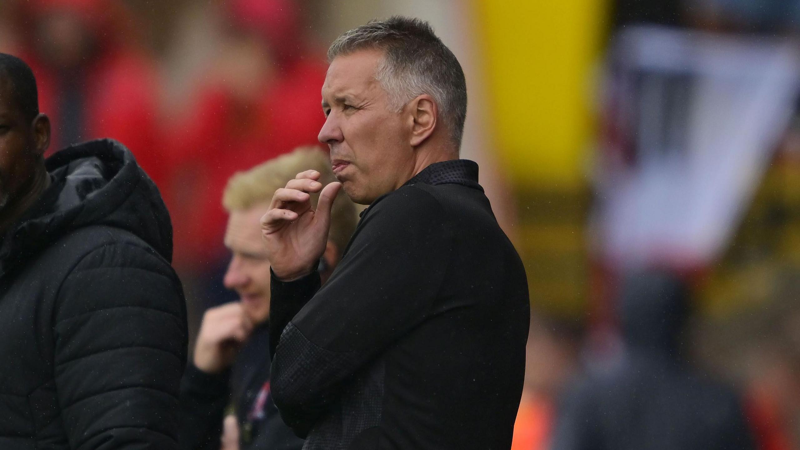 Darren Ferguson looks pensive on the touchline