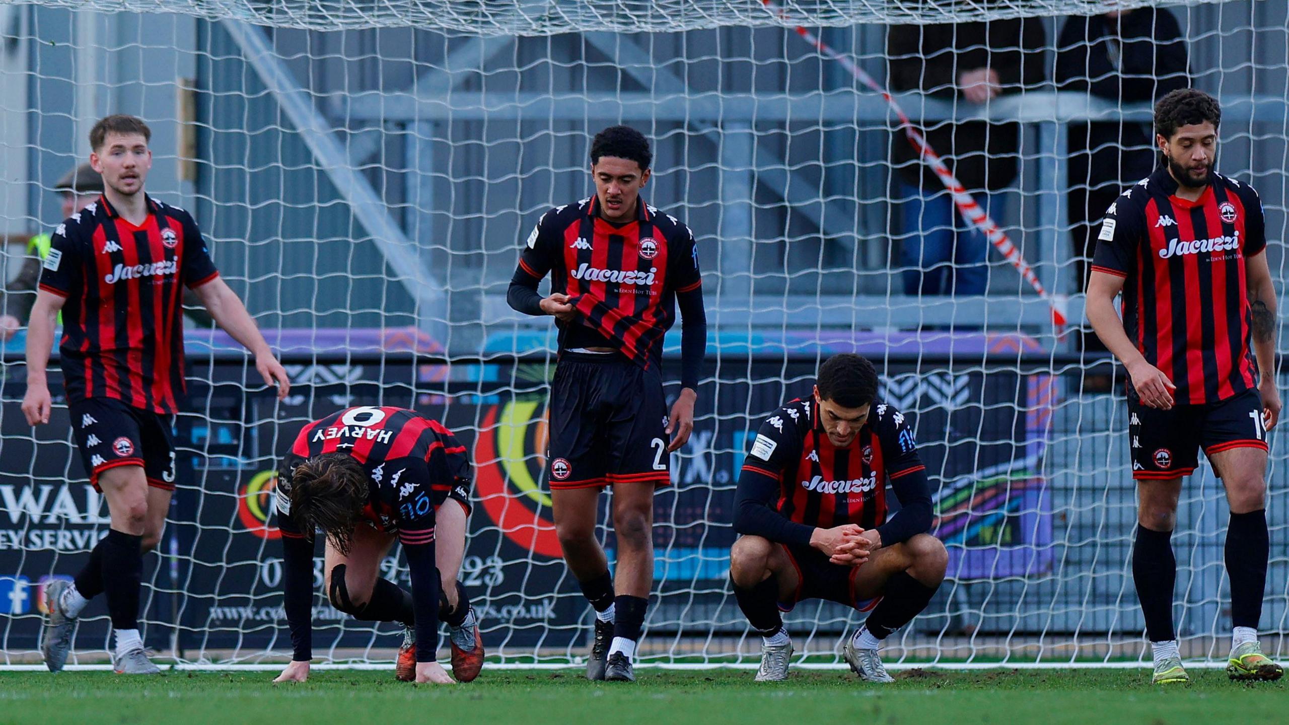 Truro's players cut forlorn figures after losing late on yet again