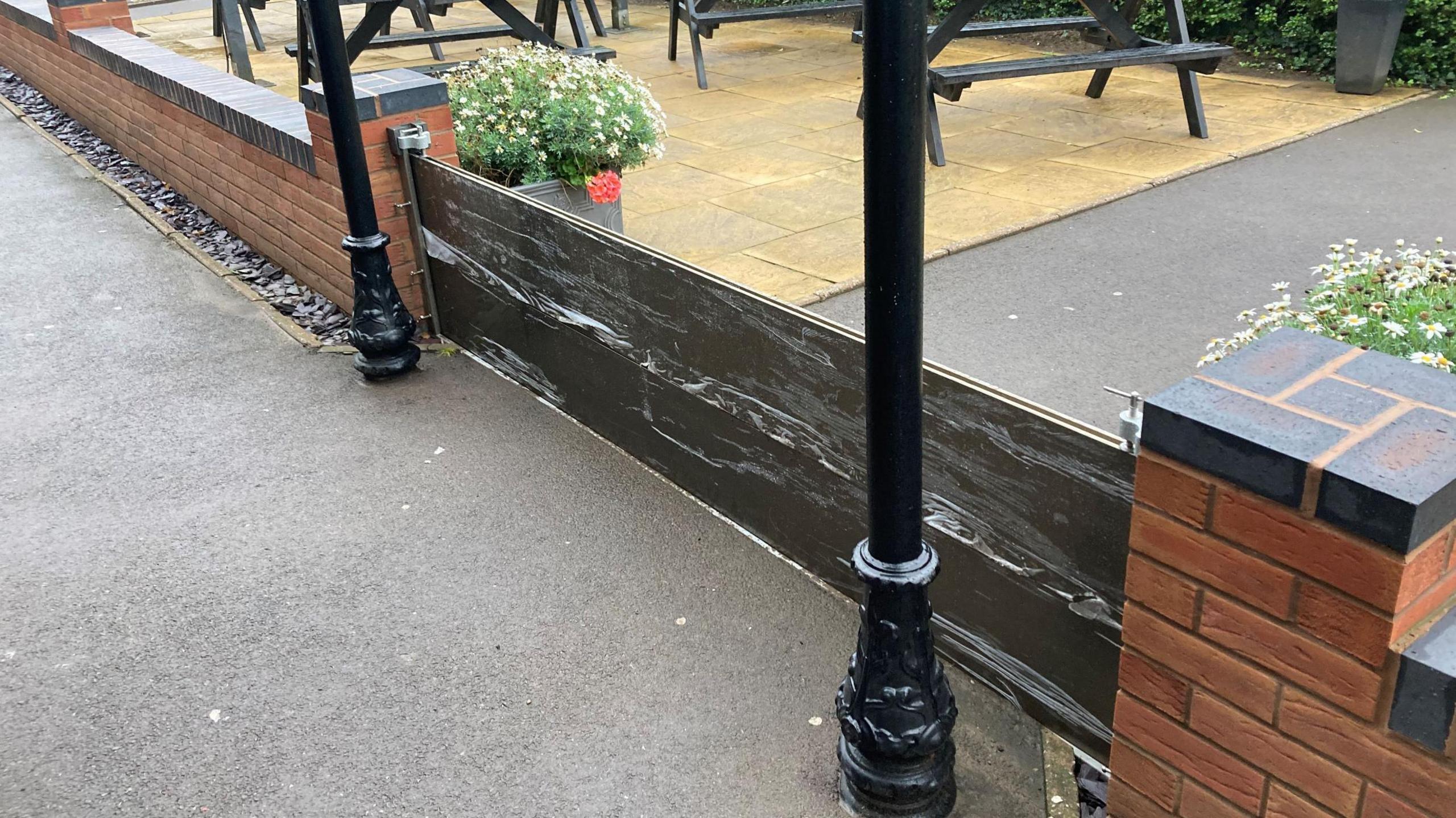 Flood barriers outside the pub