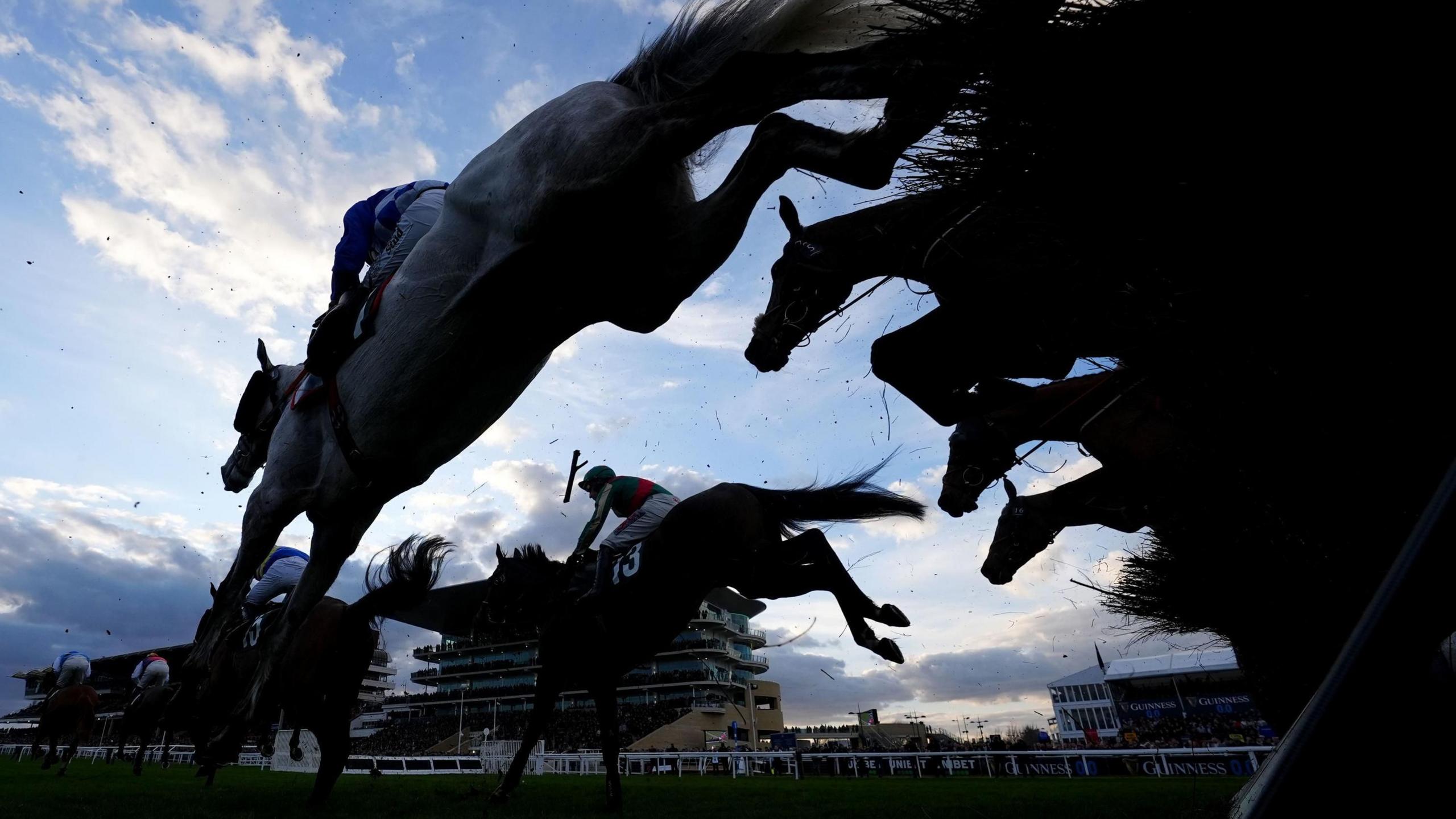 Runners and riders in the Princess Royal National Hunt Challenge Cup Novices' Handicap Chase go over the fences on day one of the Cheltenham Festival.