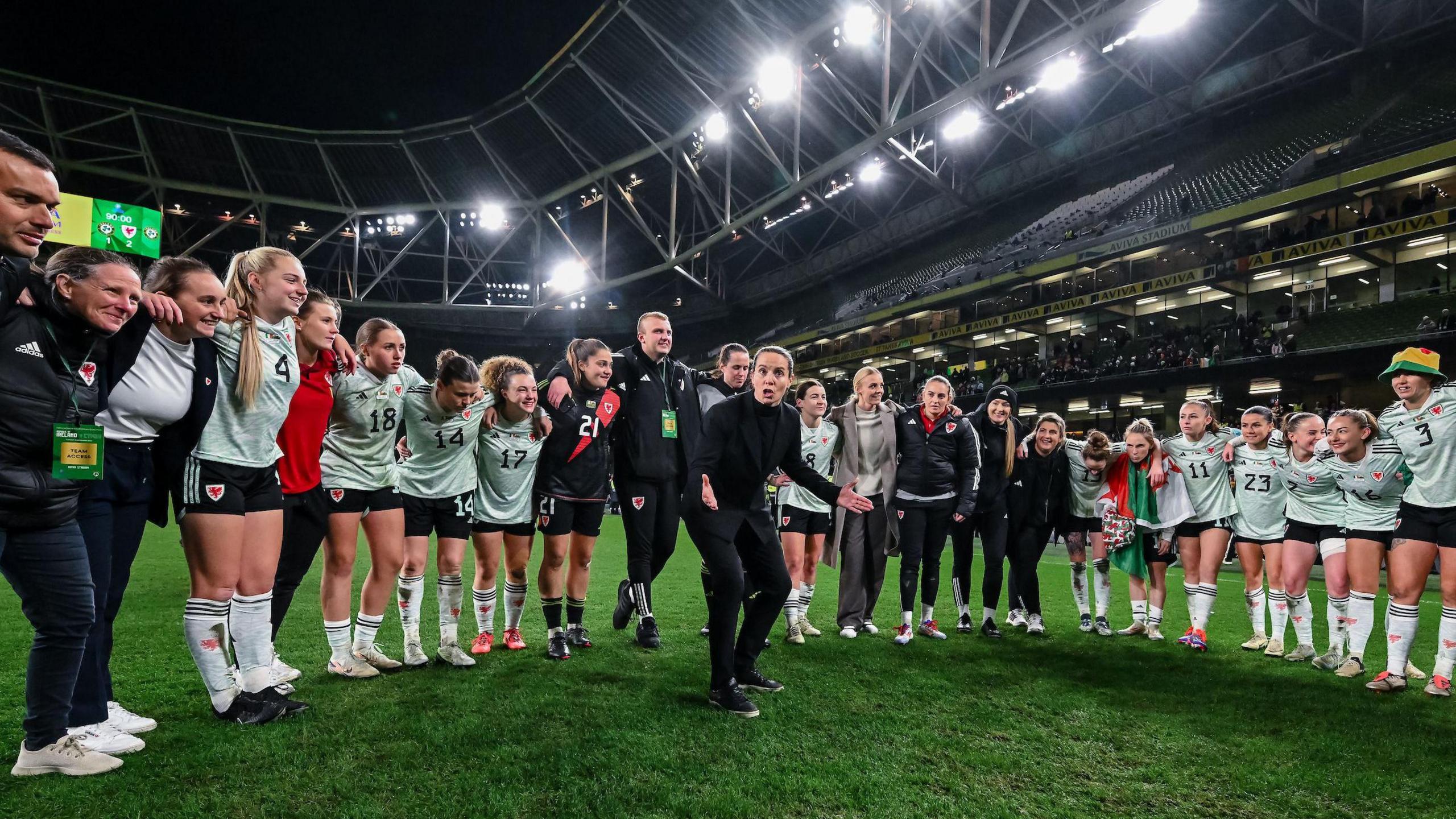 Rhian Wilkinson addresses her squad after play-off final victory over the Republic of Ireland 