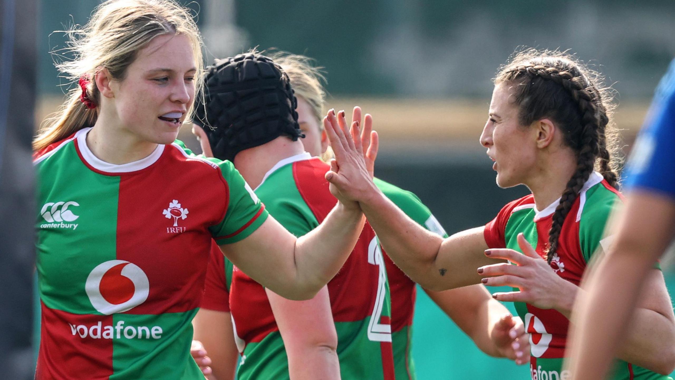 Alana McInerney celebrates with Emily Lane