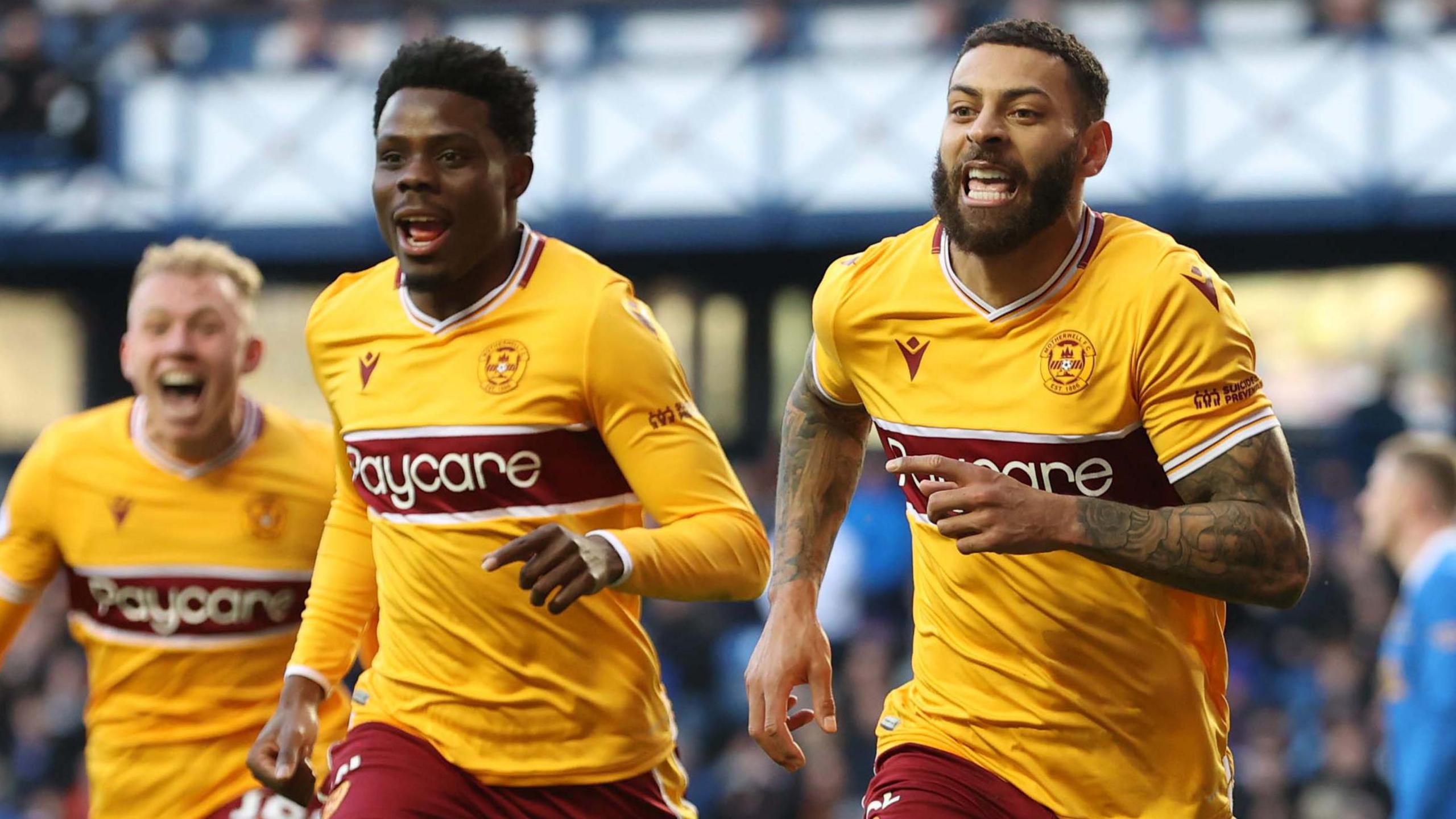 Kaiyne Woolery celebrates at Ibrox