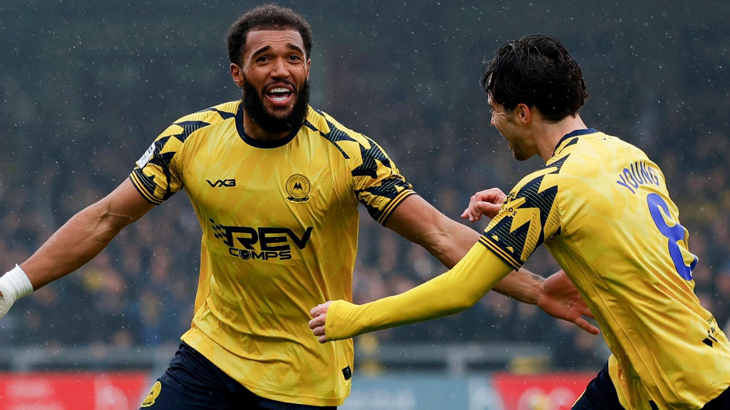 Deon Moore celebrates scoring for Torquay United