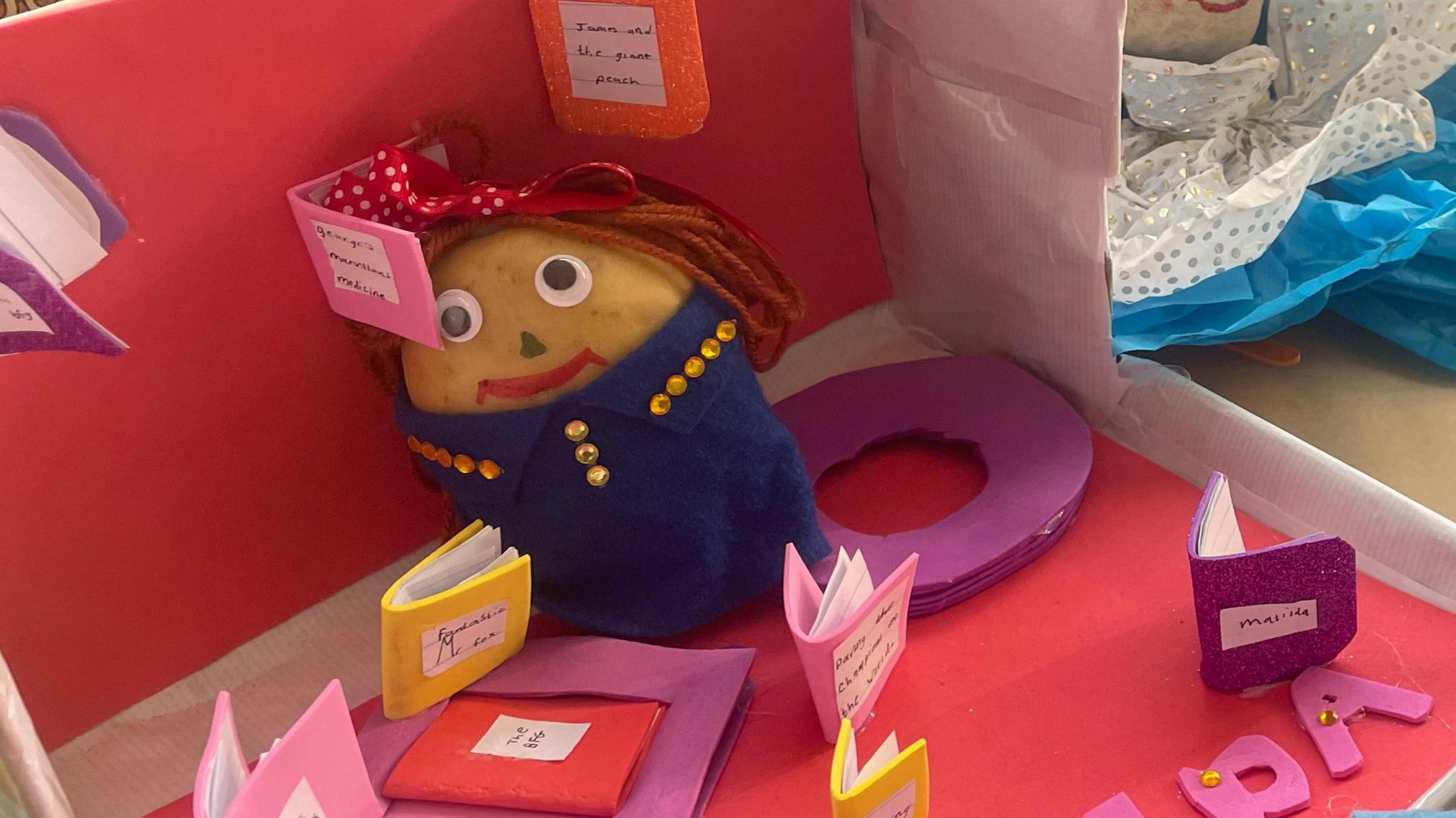 a potato decorated as Matilda