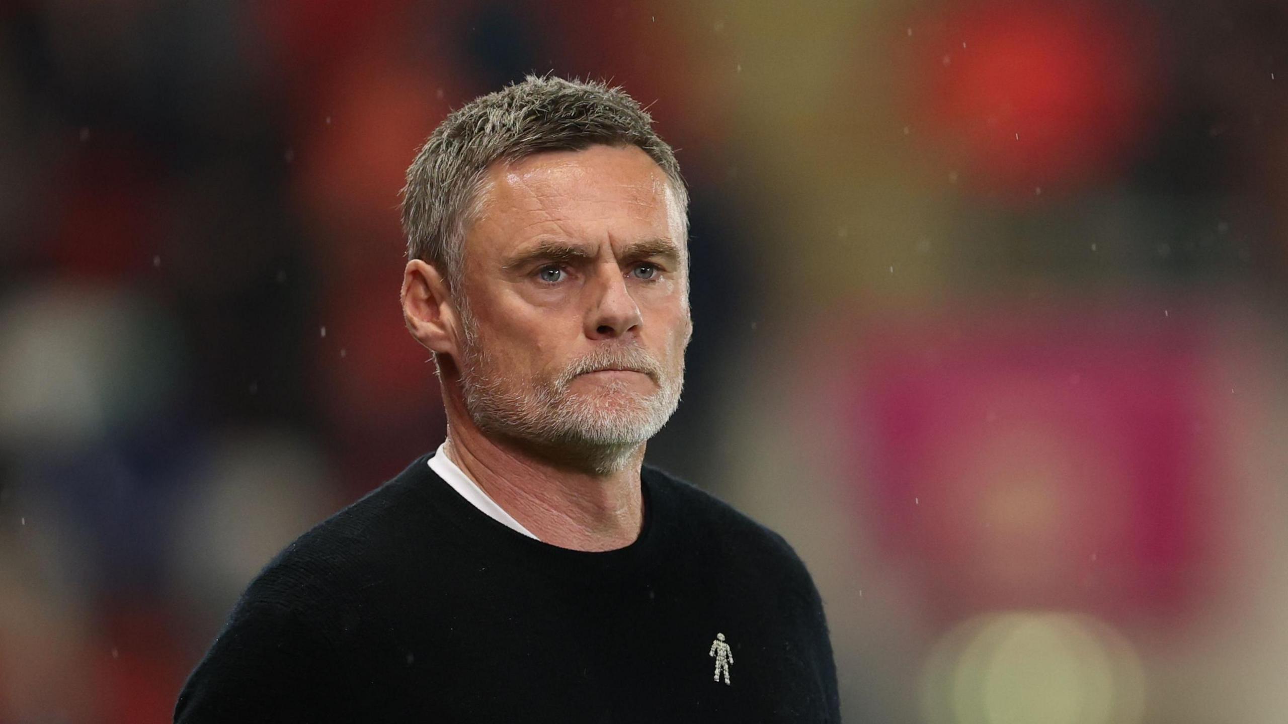 Graham Alexander watching his Bradford side in the match at Rotherham 