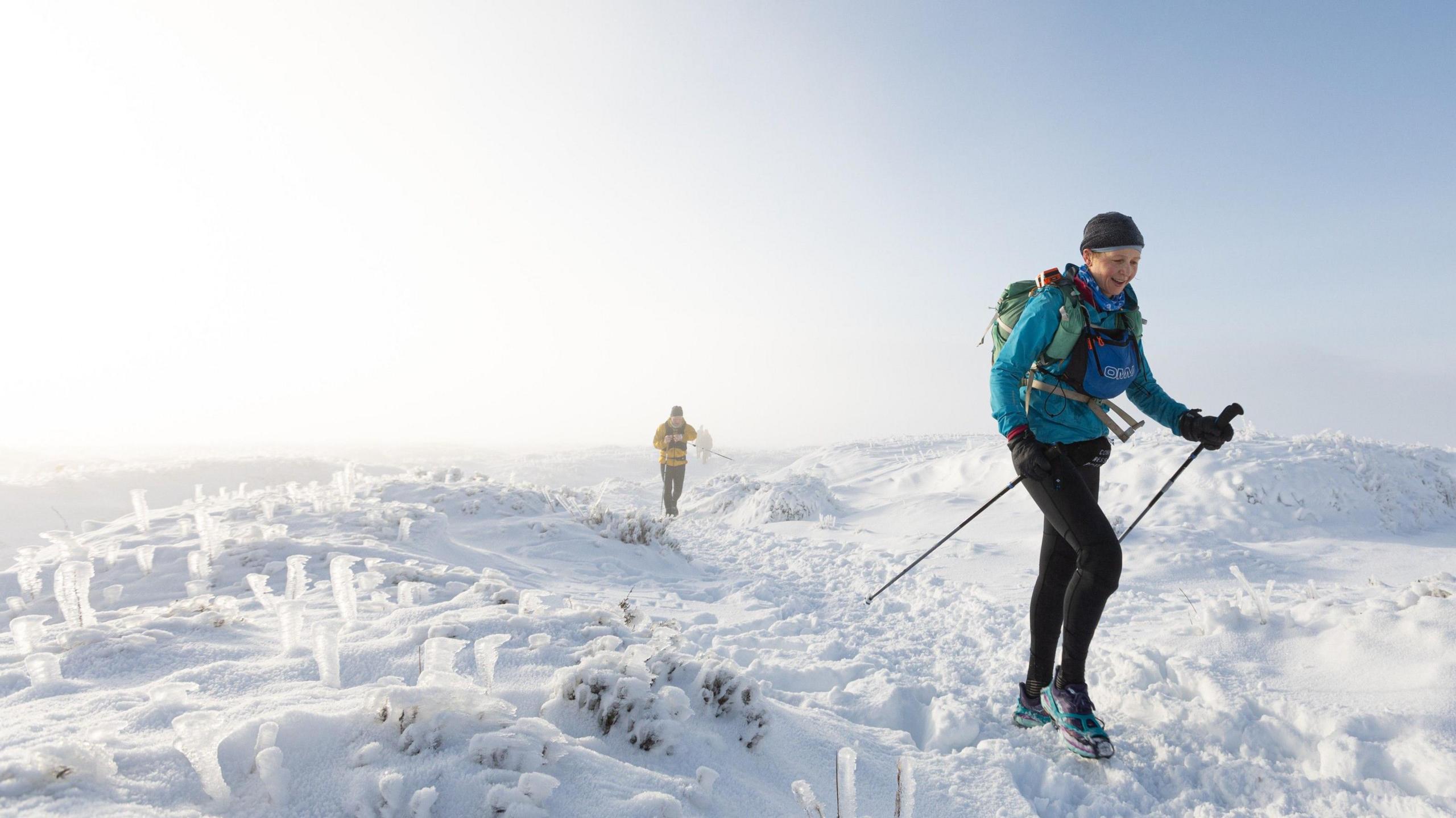 Gossage treks over snow and icy ground during the race. 