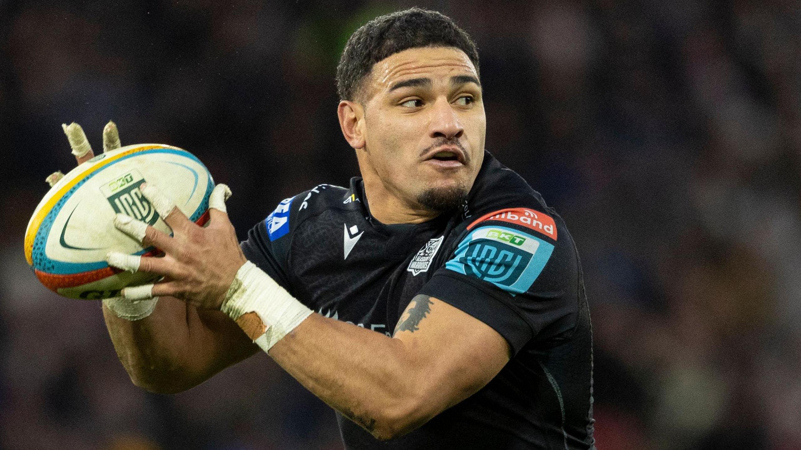 Scotland centre Sione Tuipulotu playing for Glasgow Warriors