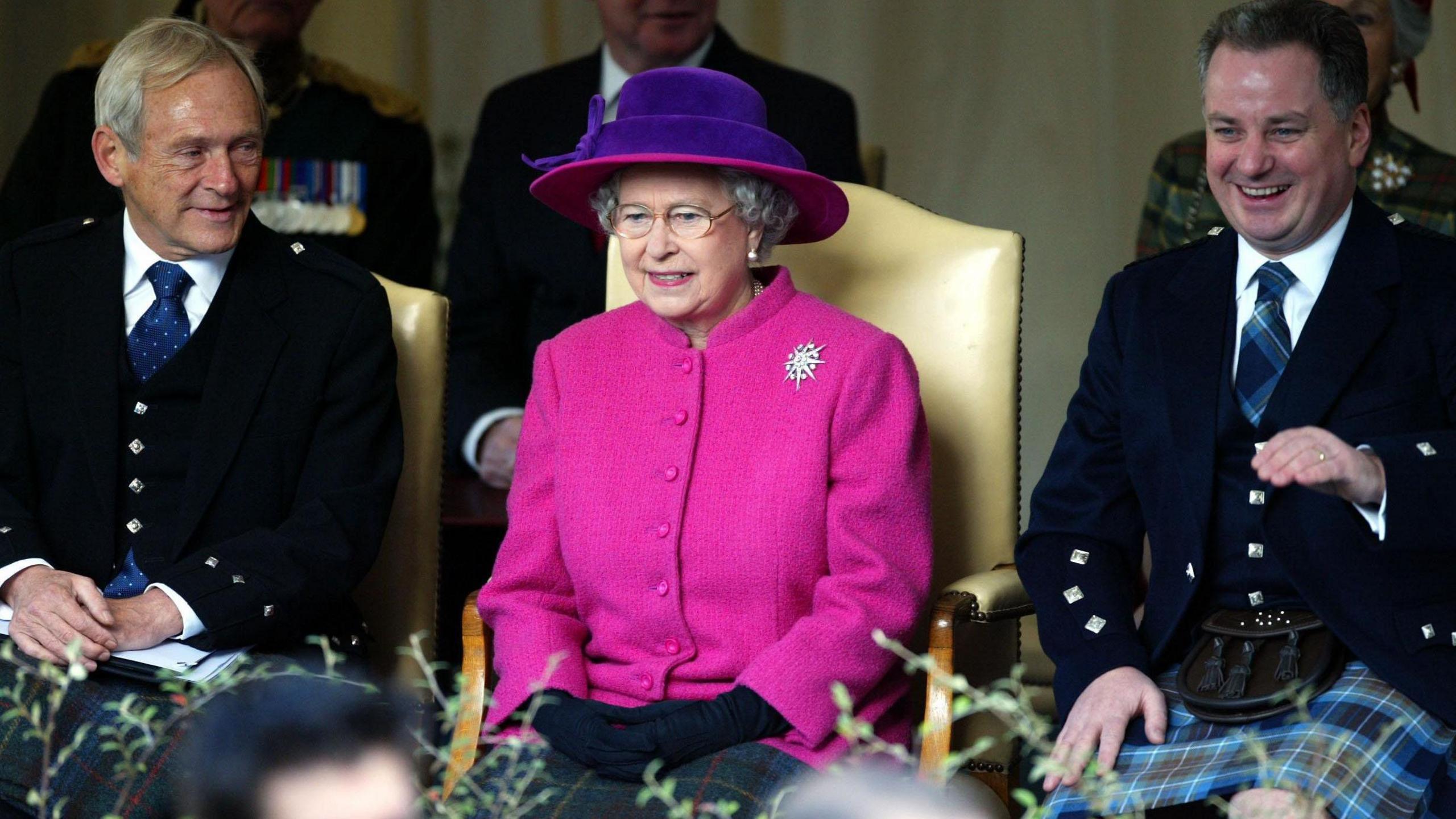 Sir George with the Queen and then first minister Jack McConnell in 2004