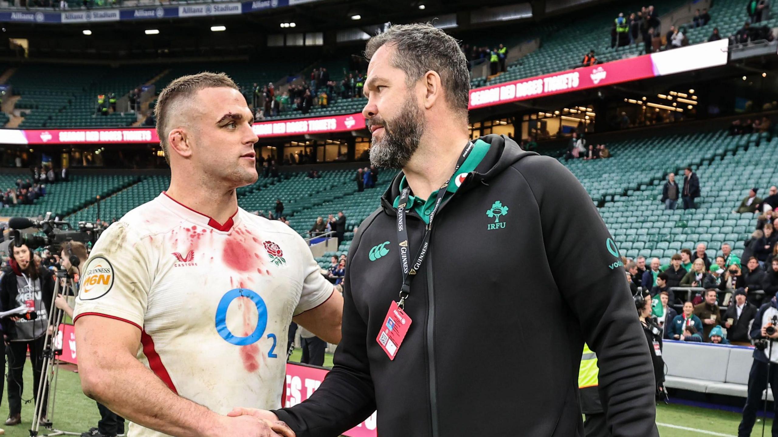 Ben Earl and Andy Farrell shake hands after the game