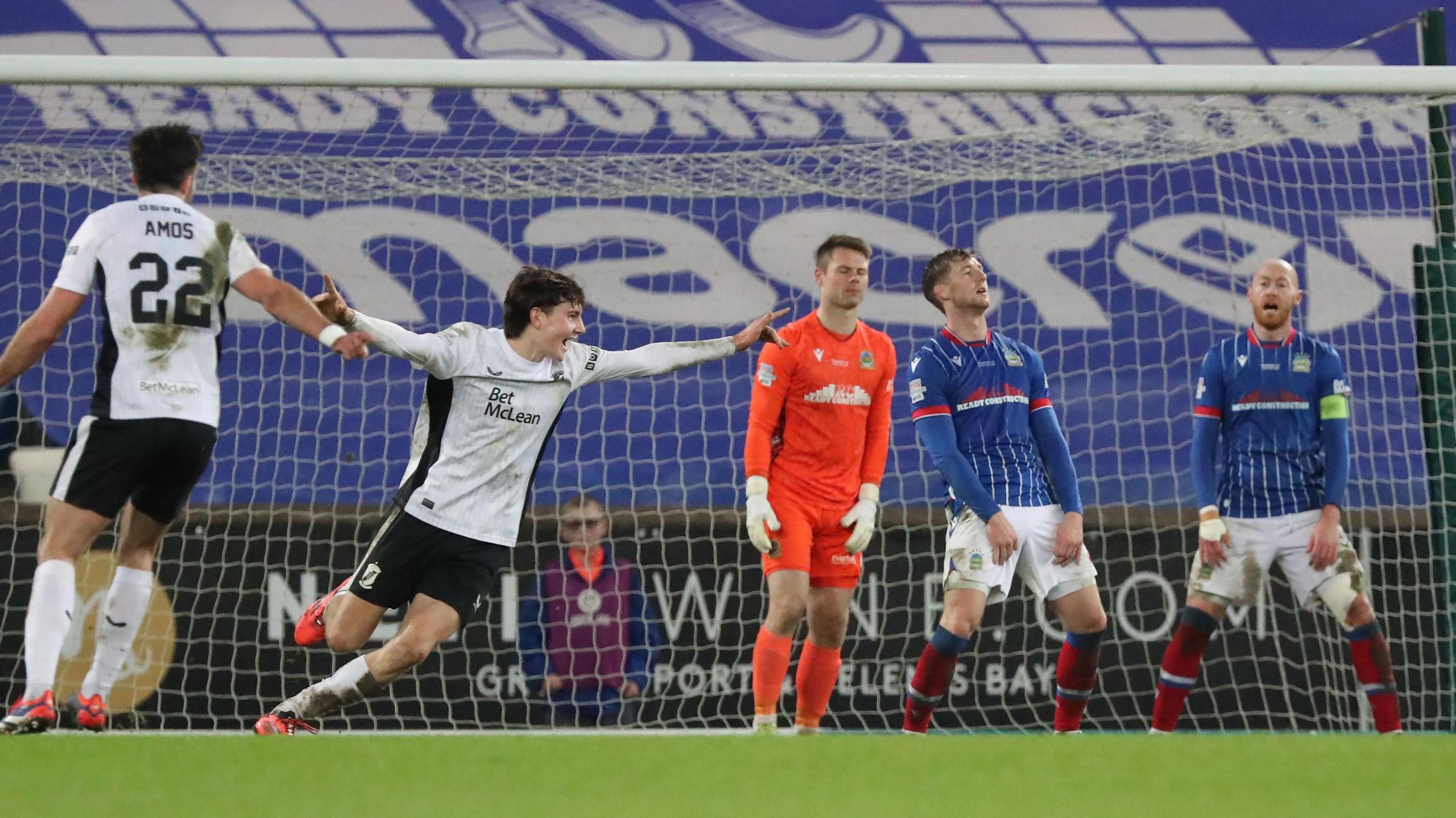 James Douglas celebrates scoring against Linfield