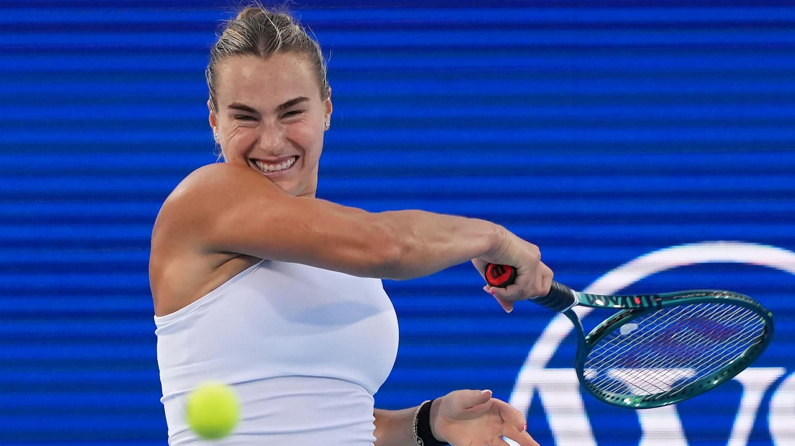 Aryna Sabalenka plays a shot