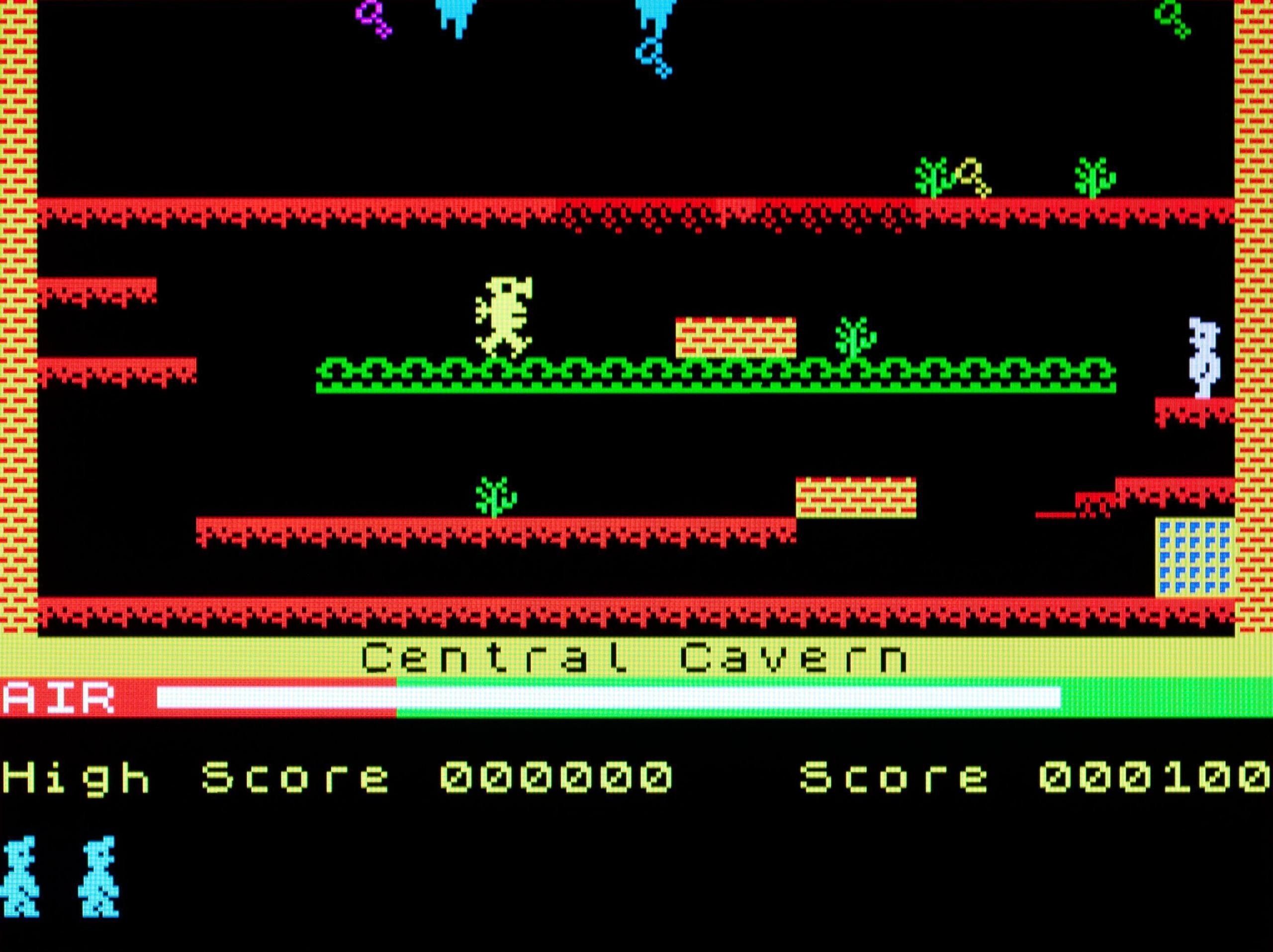 A screengrab from the ZX Spectrum computer game Manic Miner, showing a level called Central Cavern