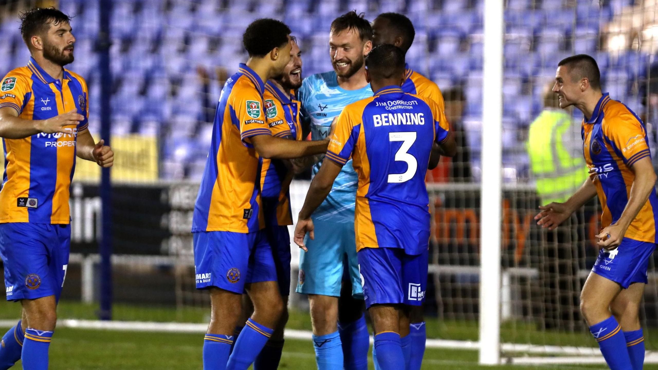 Shrewsbury's players celebrated with keeper Toby Savin