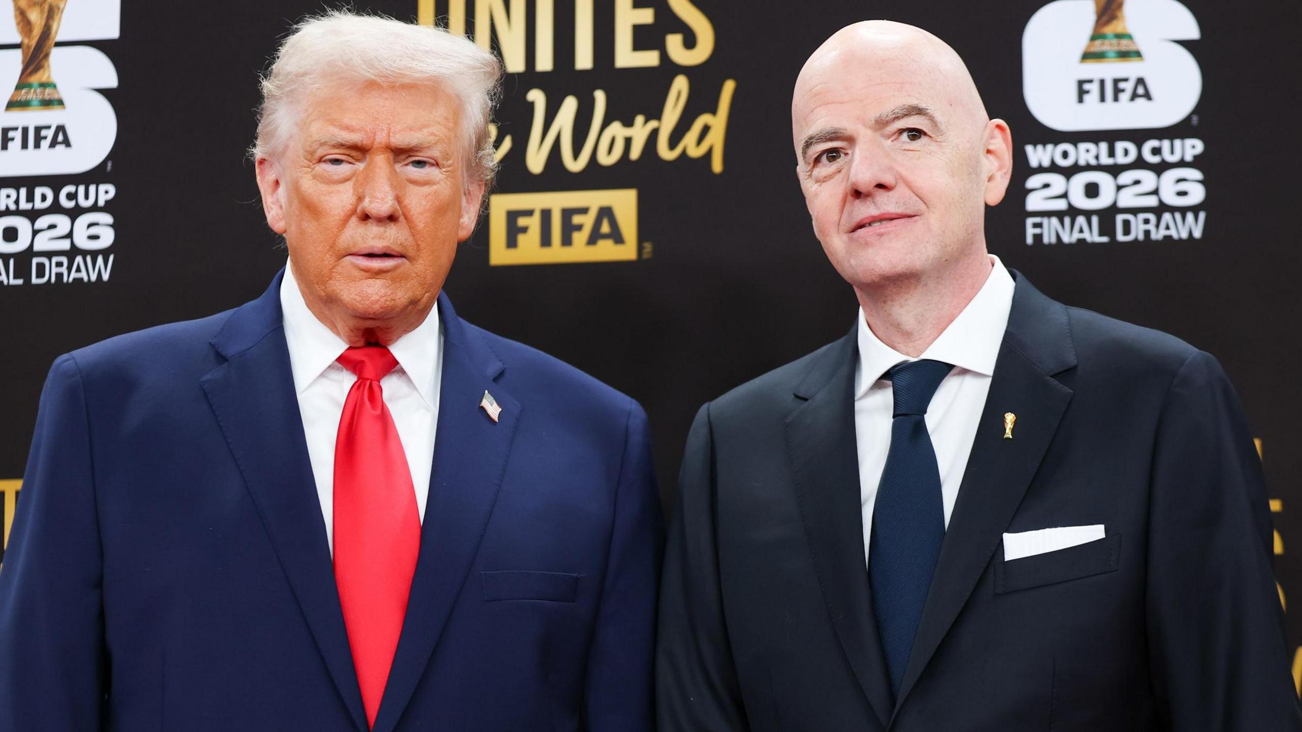 US President Donald Trump and Fifa president Gianni Infantino stand next to each other