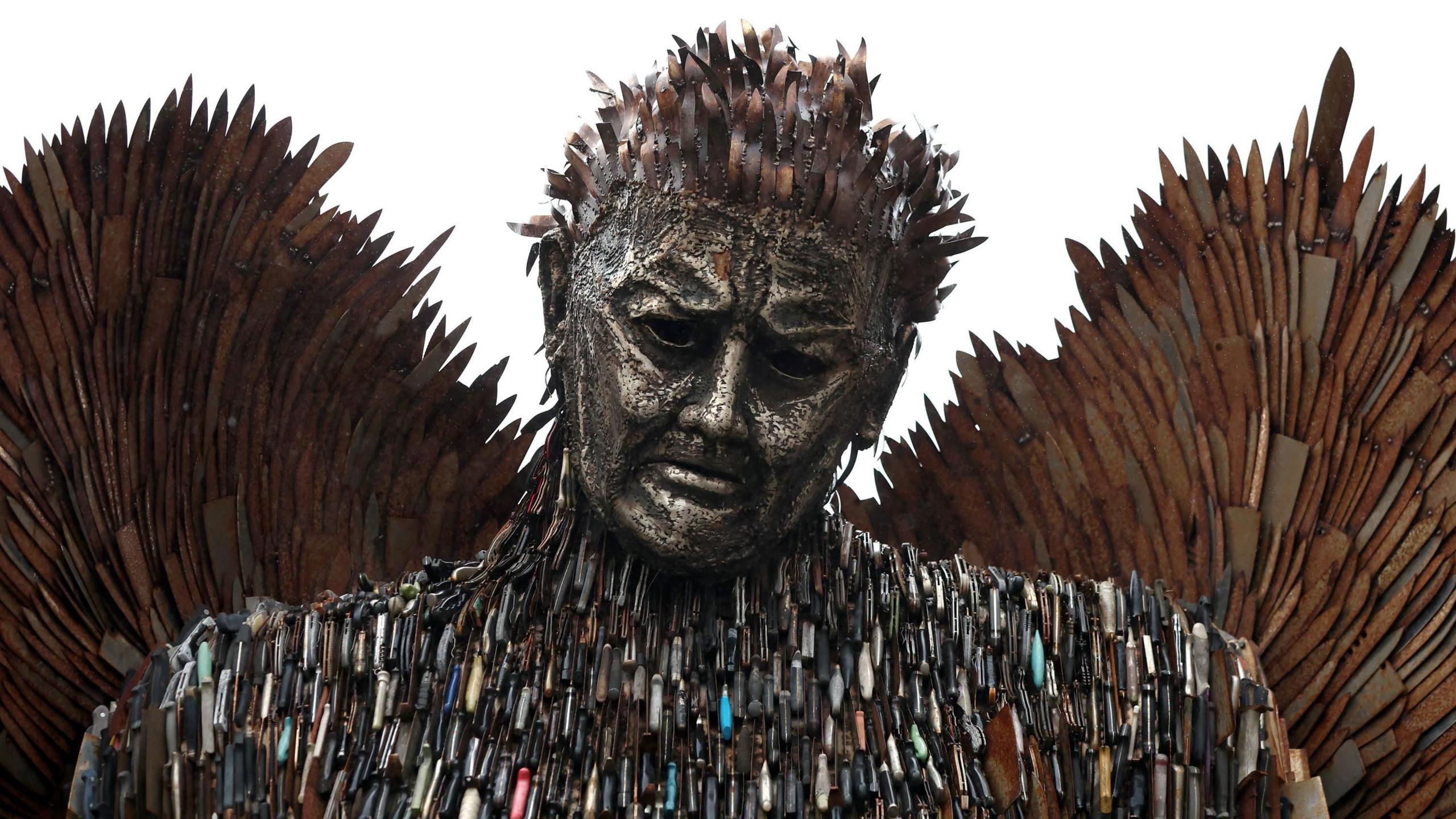 Close up of the knife angel, the statue is made up of knives 