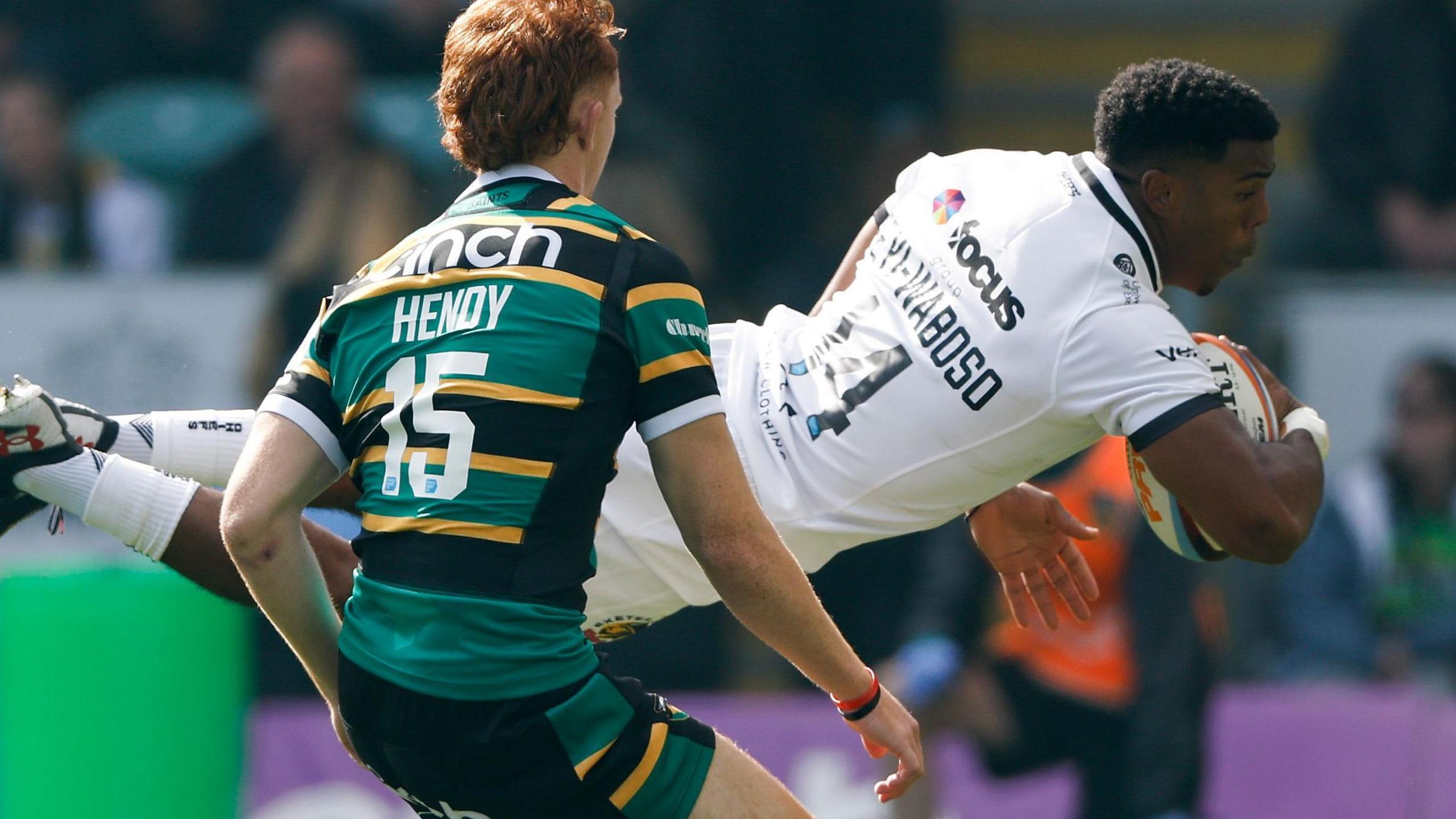Immanuel Feyi-Waboso scored two tries and picked up an injury as Exeter secured a draw at Northampton Saints
