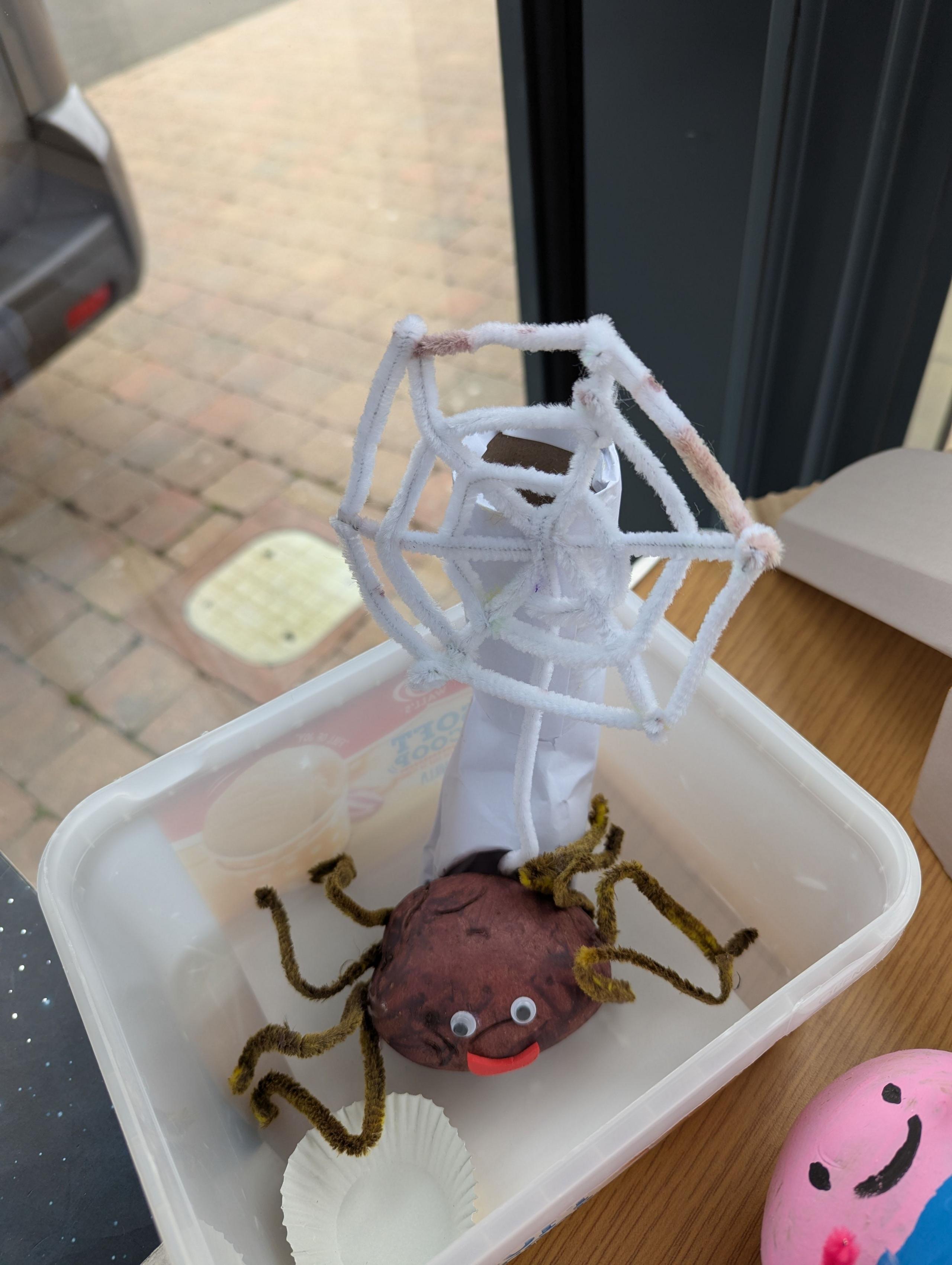 a potato painted as Charlotte from the children's book Charlotte's Web