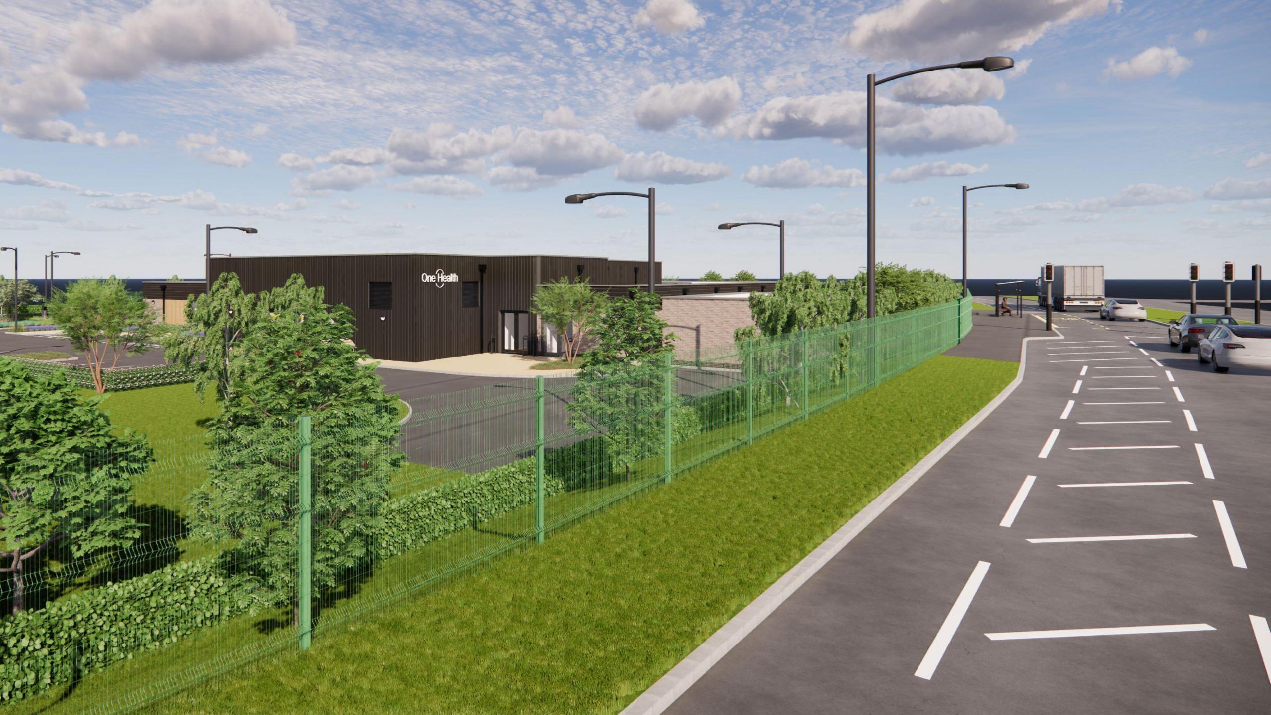 A visual impression of the future One Health Group surgical hub. The brown, single-storey building stands behind a green metal fence and is flanked by green bushes and trees.
