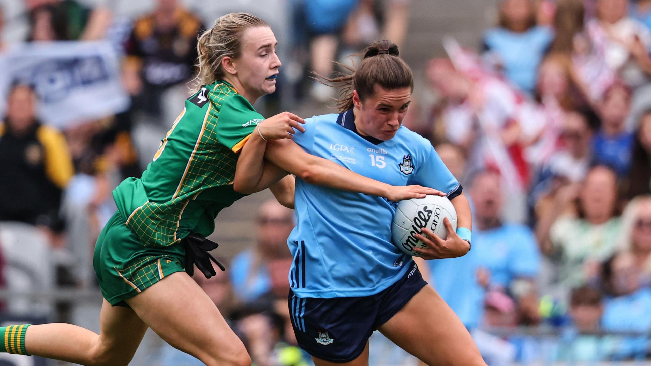 Mary Kate Lynch of Meath tackles Kate Sullivan of Dublin during the 2025 All-Ireland Ladies football final at Croke Park.