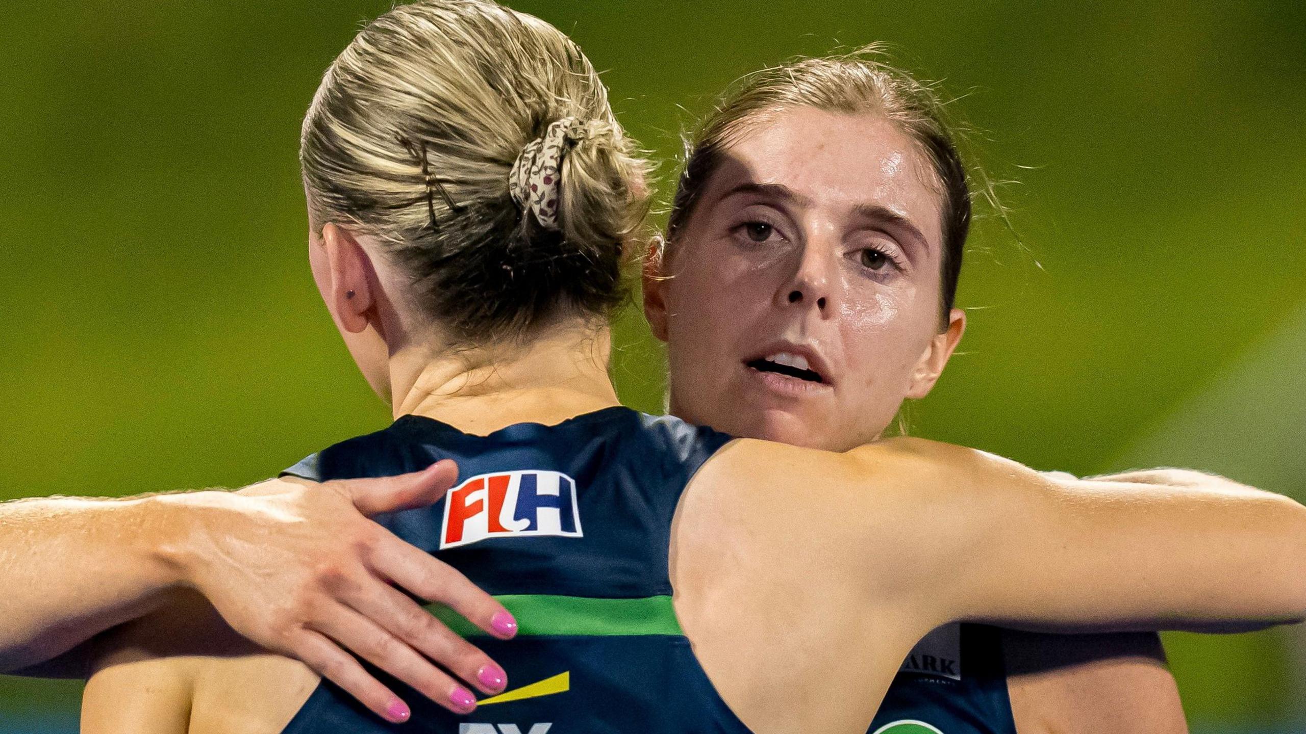 Katie Mullan and Katie Larmour console each other after the Germany game