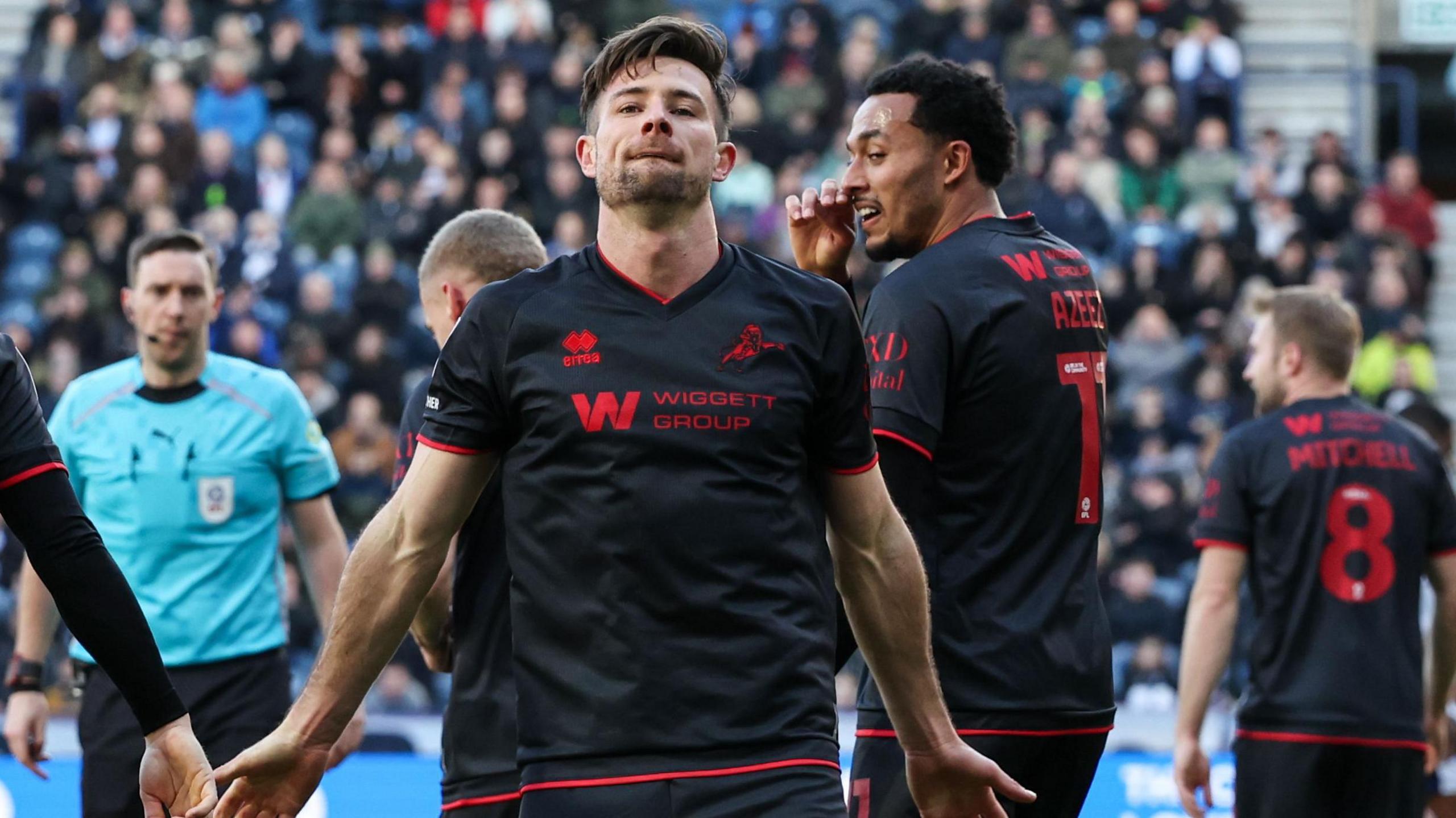 Ryan Leonard celebrates scoring