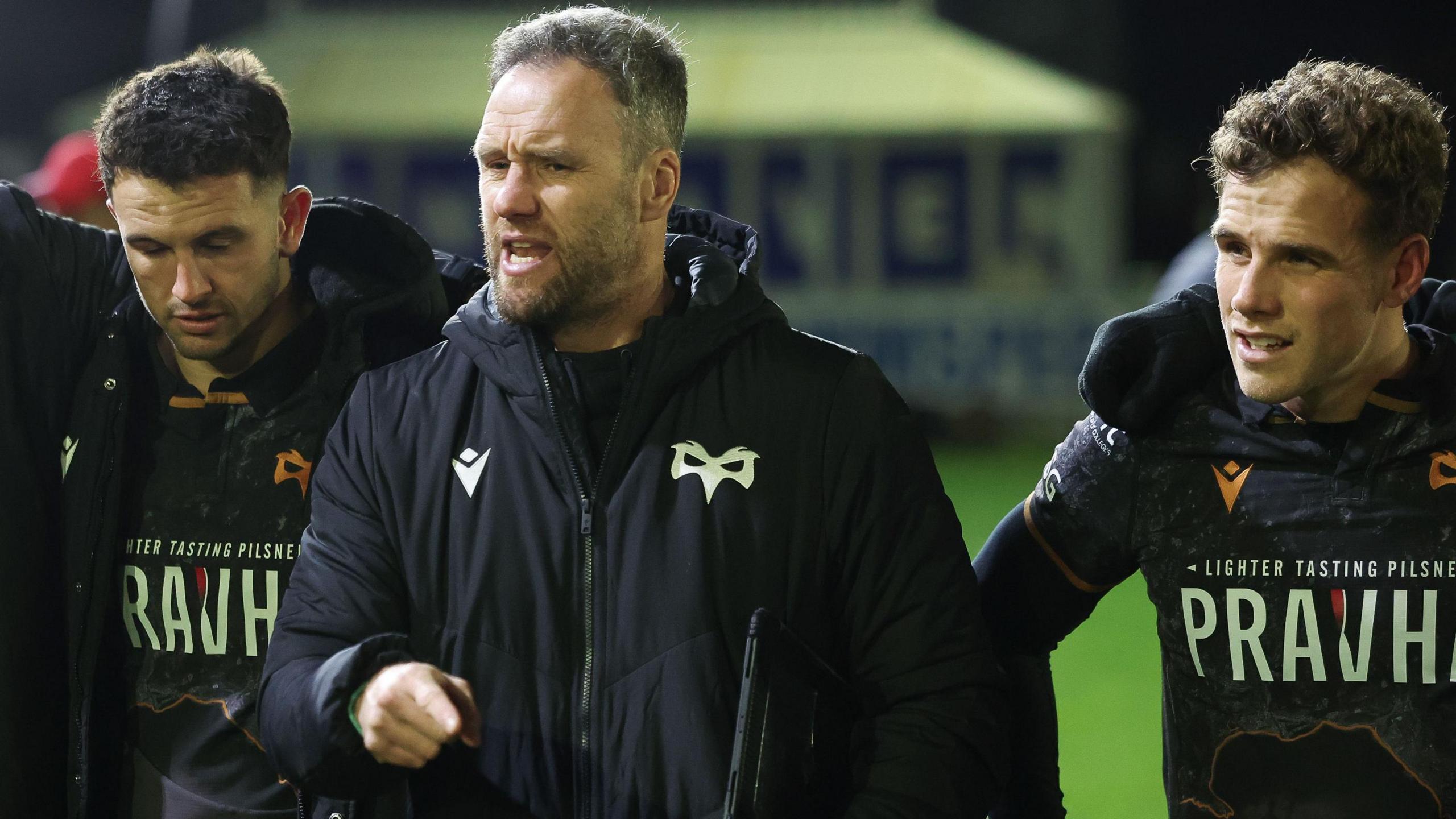 Ospreys head coach Mark Jones talks to his squad