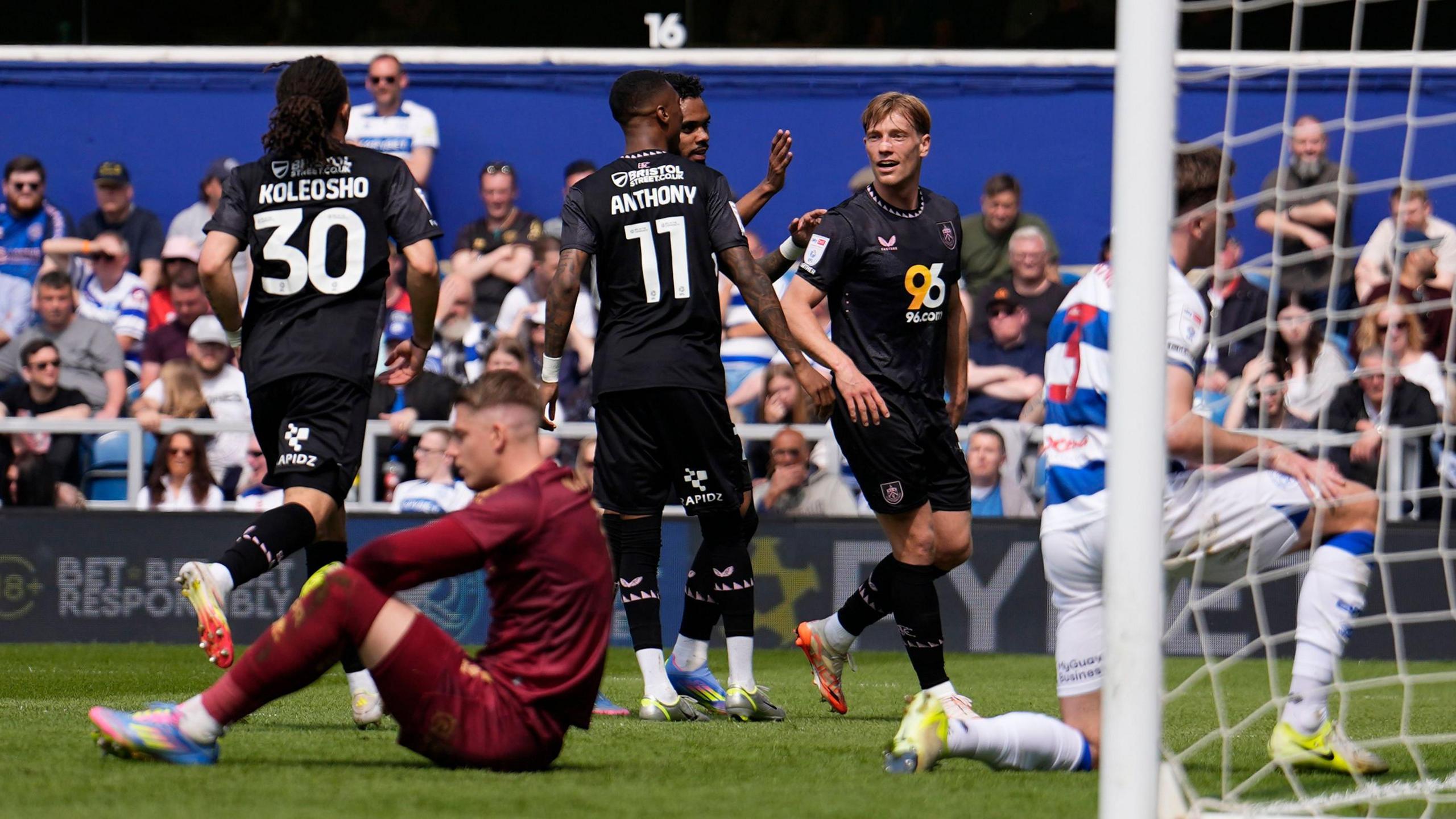 Burnley players celebrate after Zian Flemming's first of two goals on the day