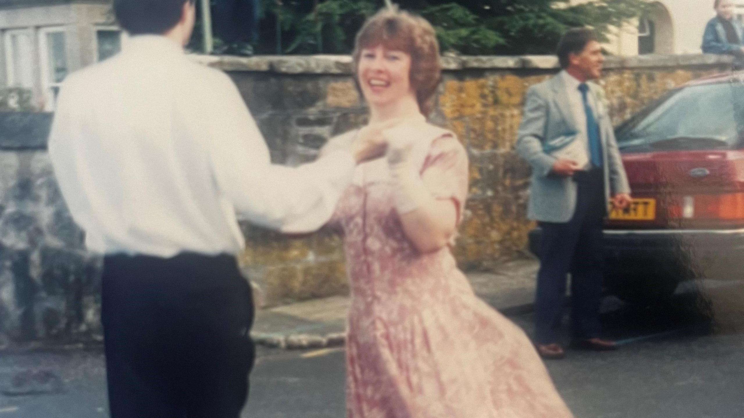 Couple dancing in the street