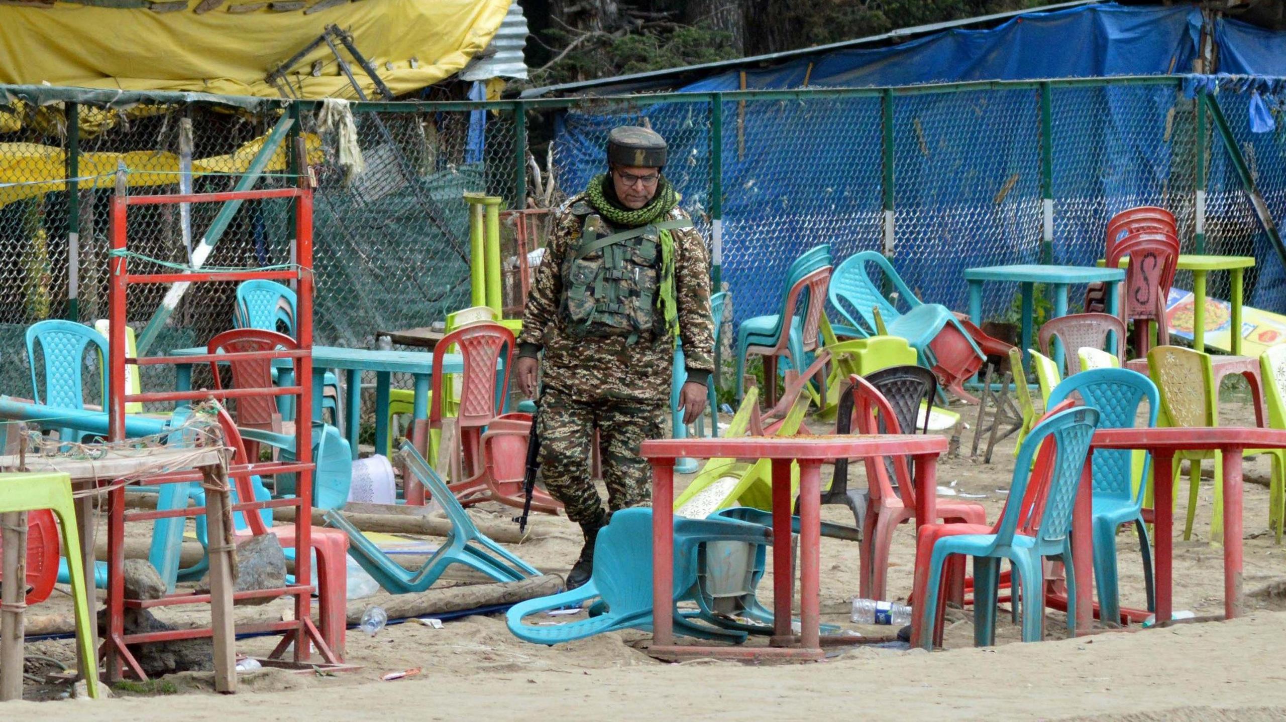 Gunmen shot dead 26 people, mostly tourists, in Indian-administered Kashmir's Pahalgam in April. The photograph shows a soldier patrolling the location of the killings.