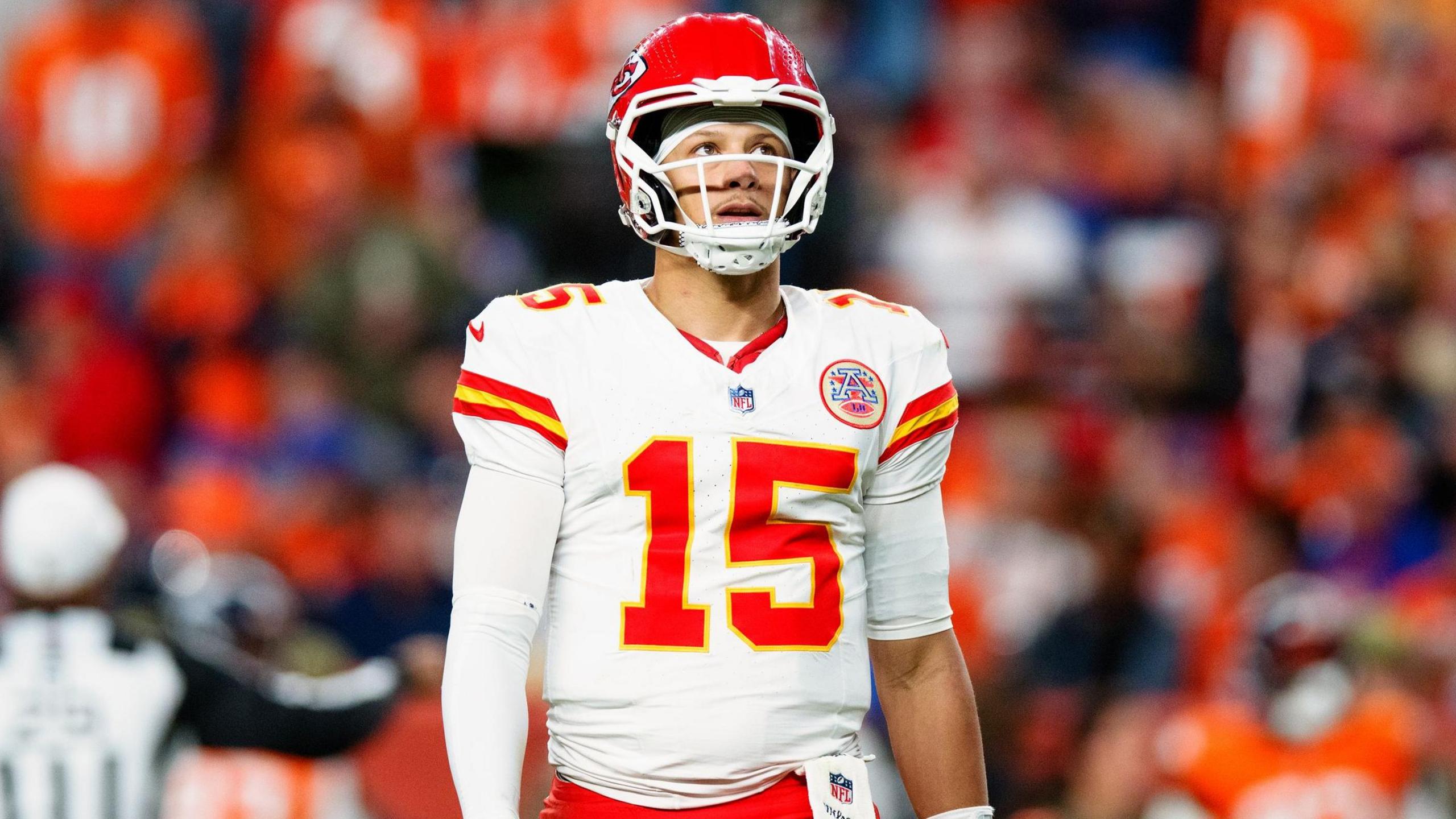 Patrick Mahomes looks down after the Chiefs lose at the Broncos