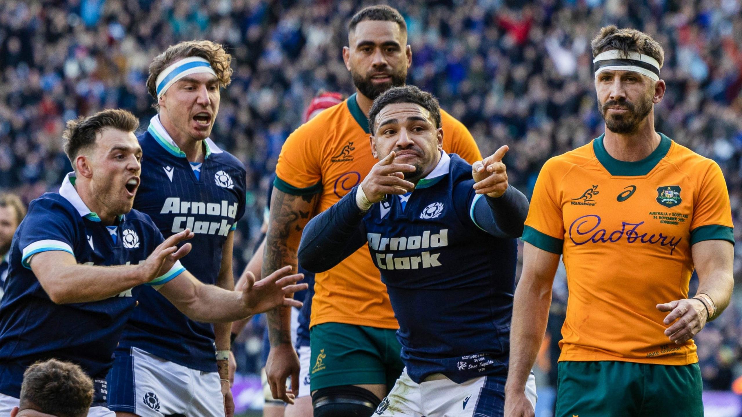 Sione Tuipulotu celebrates scoring a effort   for Scotland