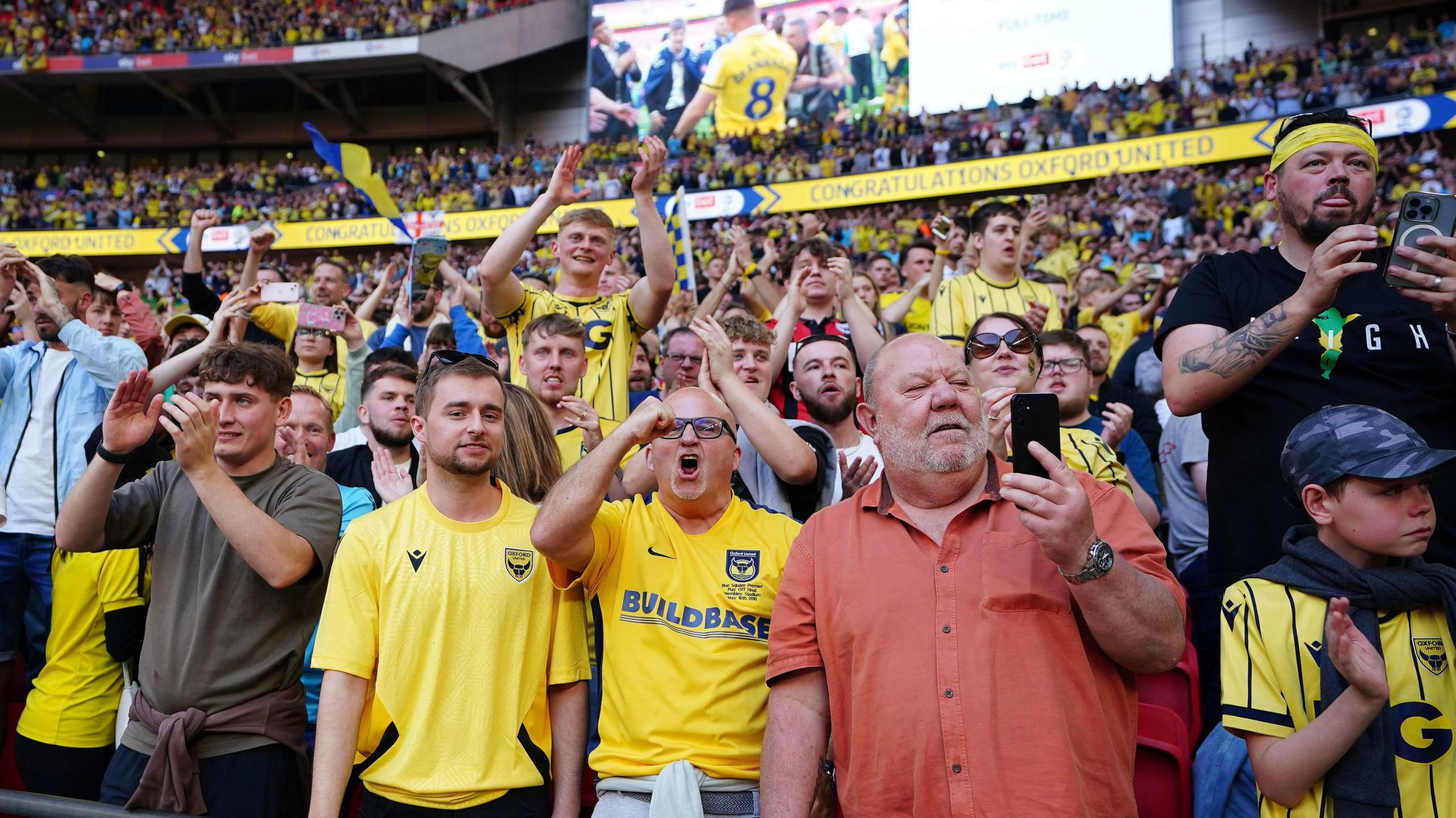 Oxford United fans watching the match