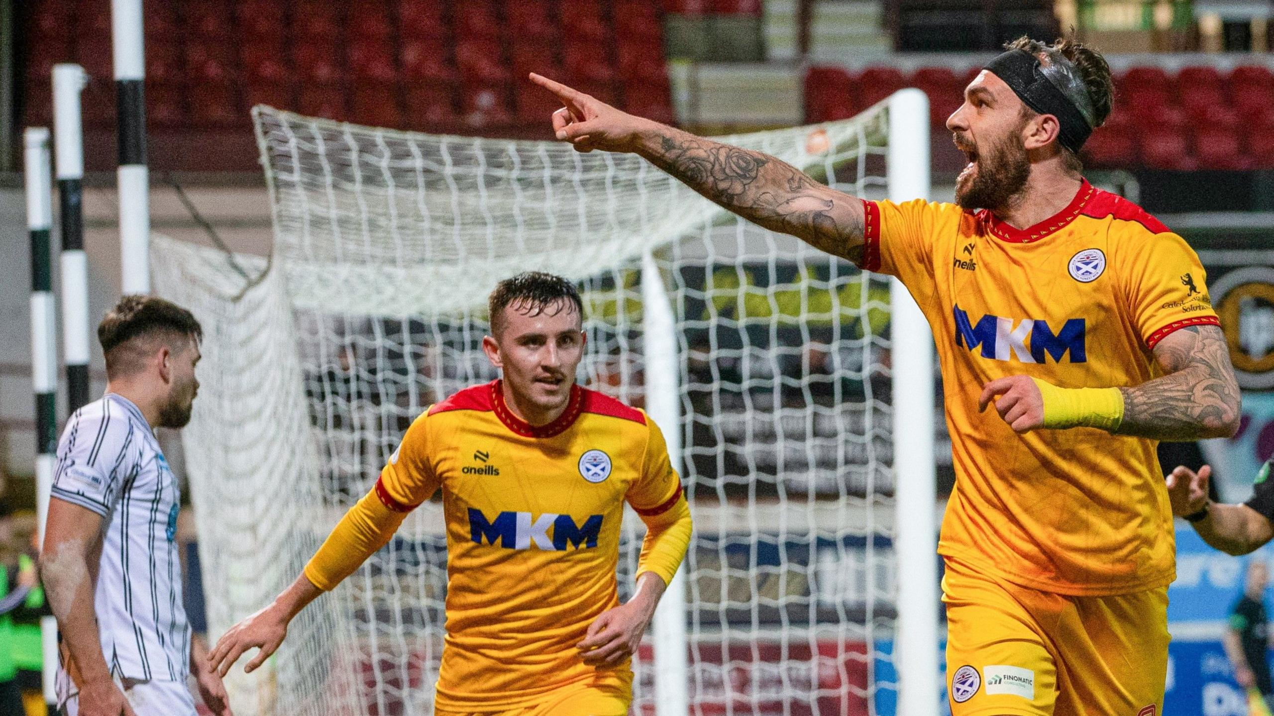 George Oakley celebrates after doubling Ayr's lead