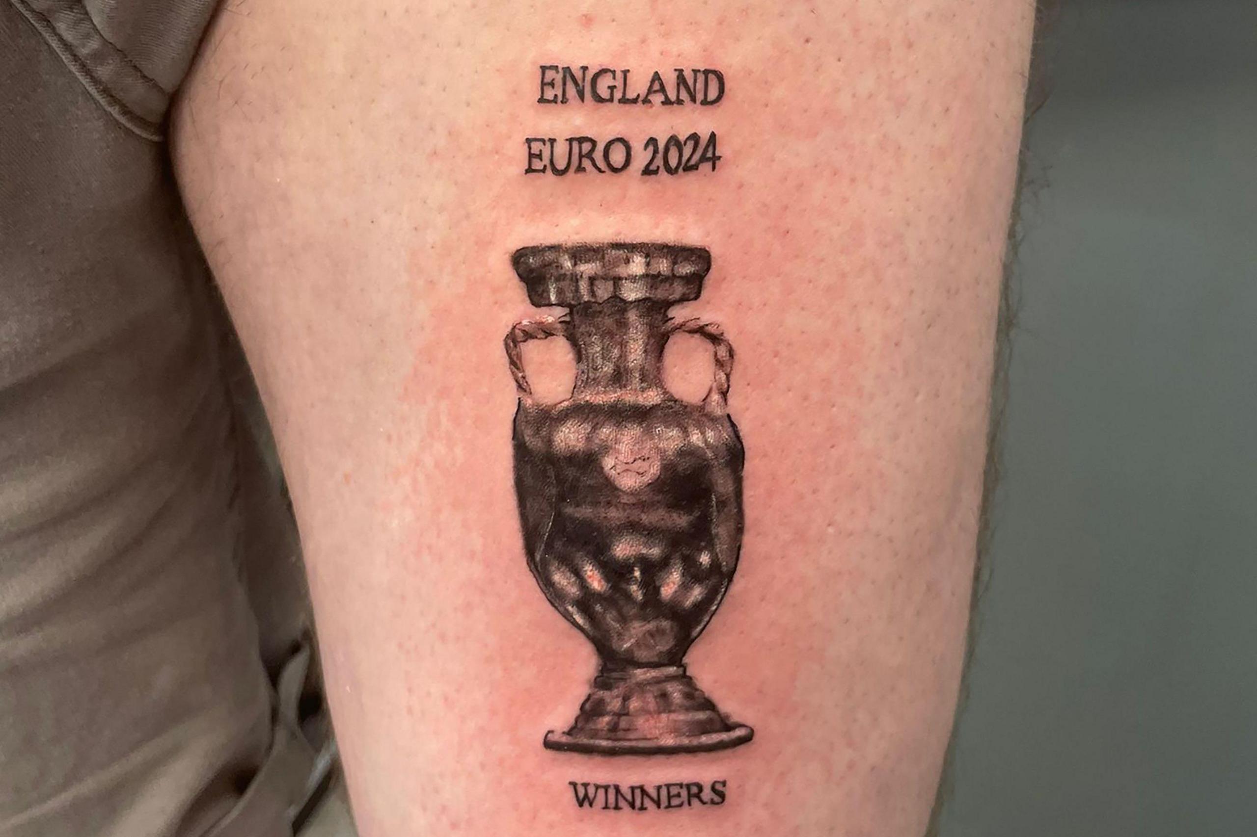 Man tattoos trophy and words: "England Euro 2024 Winners" on his leg ahead of the final.