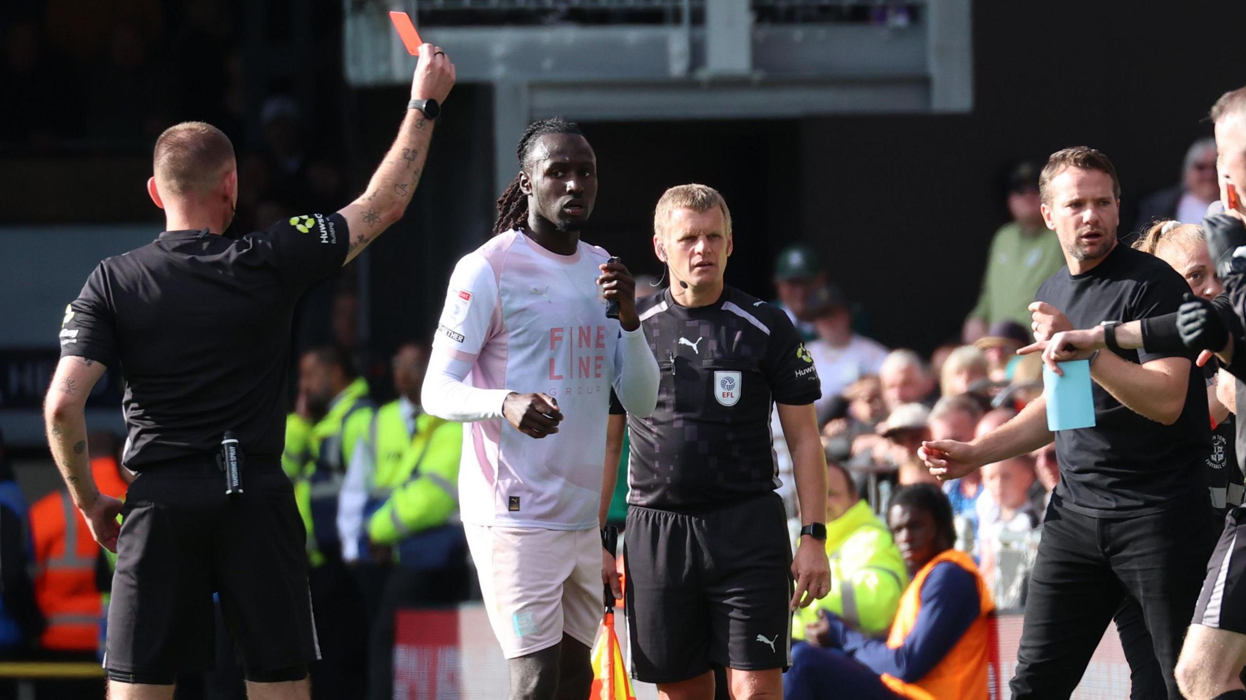 Tom Cleverley is sent off