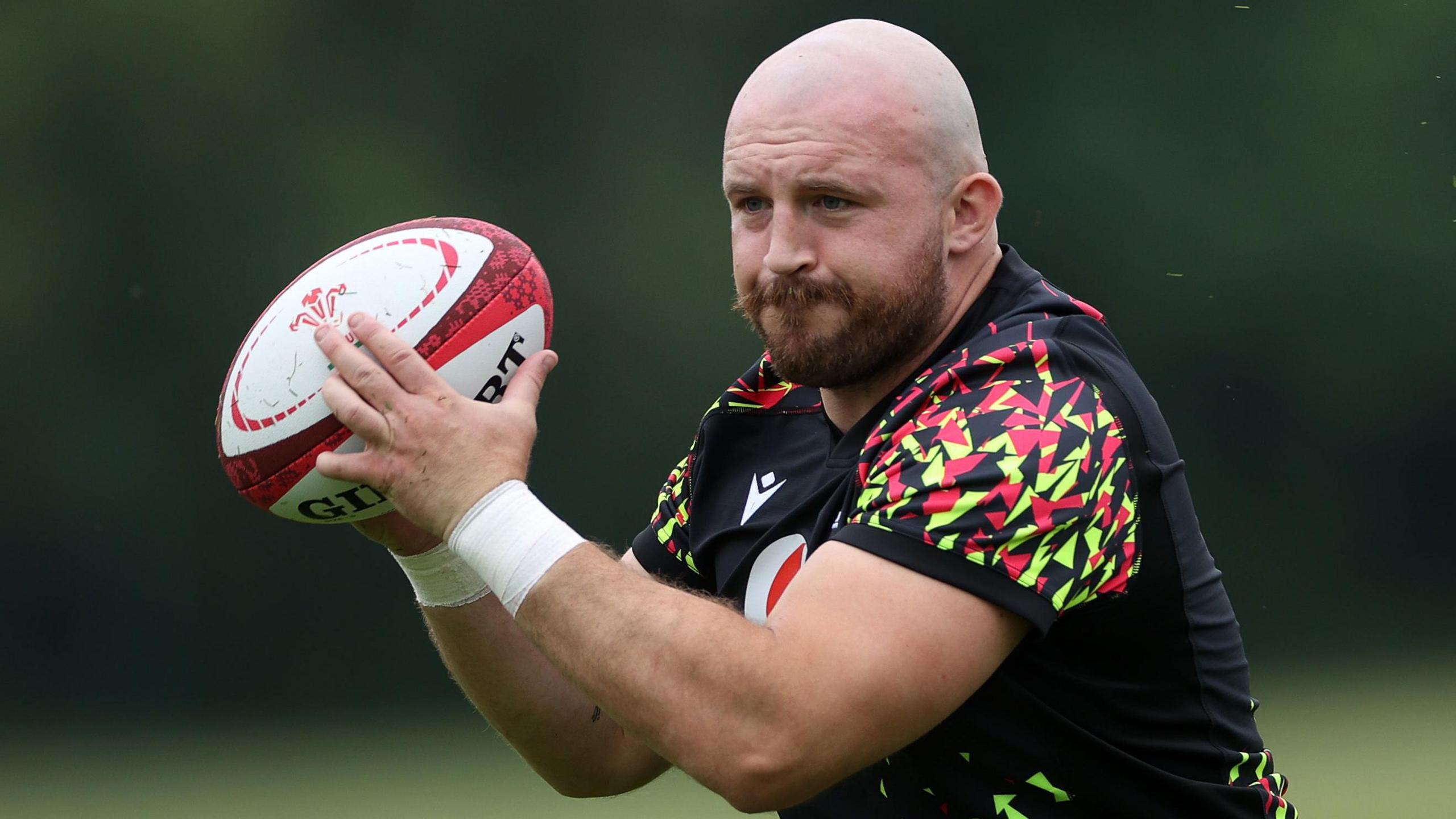 Dillon Lewis with the ball in training for Wales ahead of the Barbarians game
