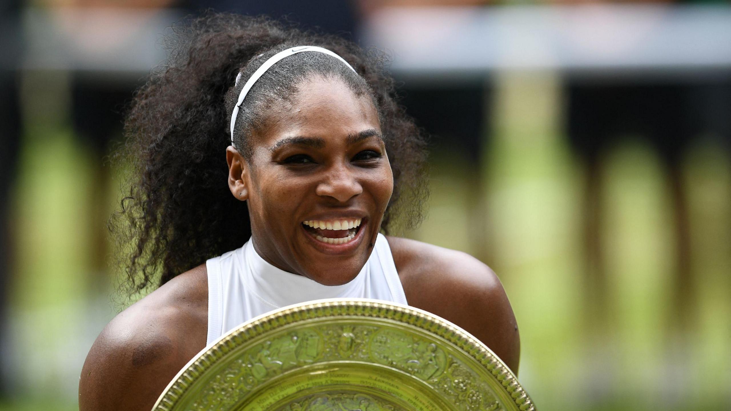 Serena Williams celebrates winning the Wimbledon title in 2016