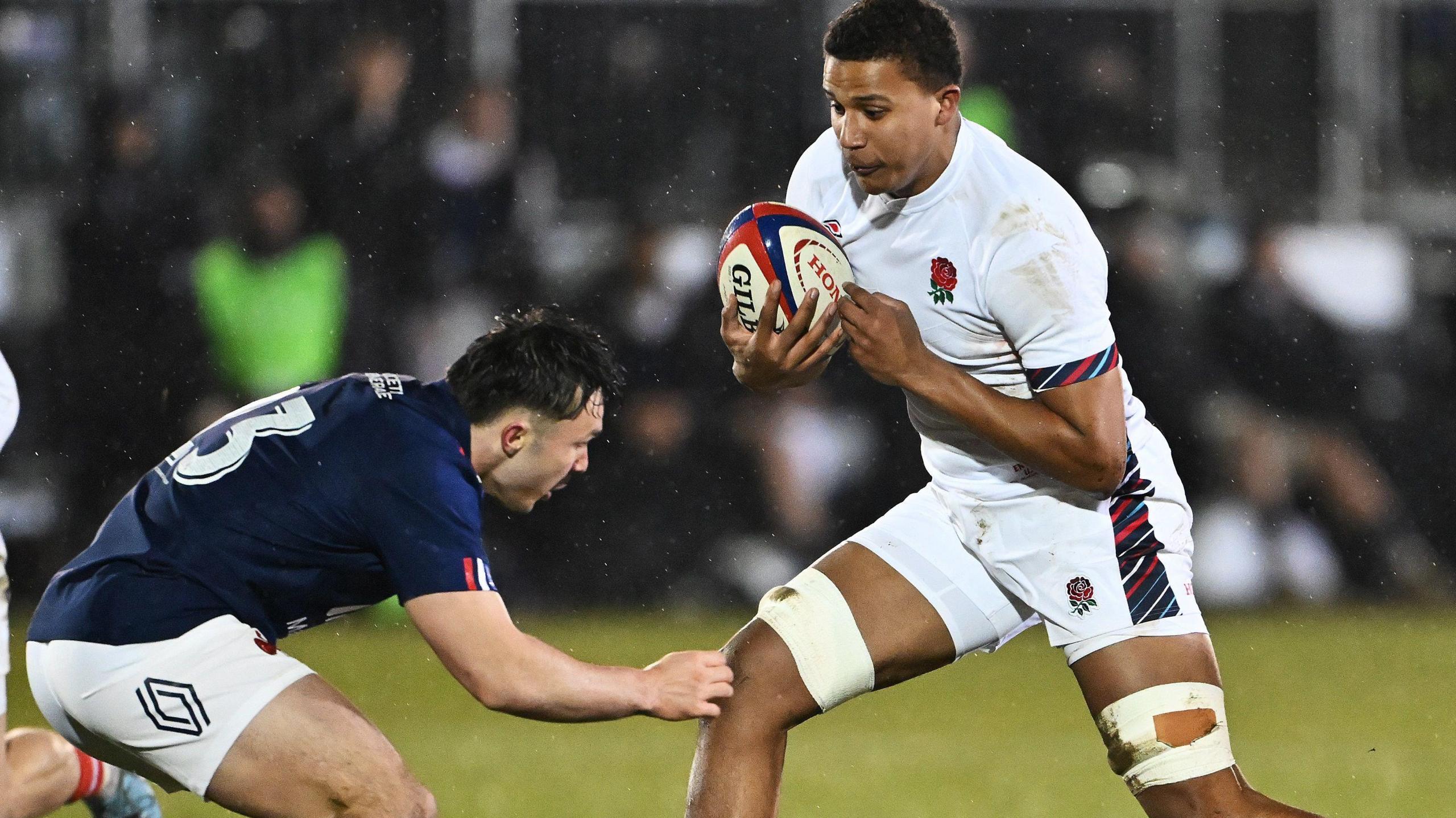 Aiden Ainsworth-Cave of England runs at Jean Cotarmanac'h of France during the U20 Six Nations 2025