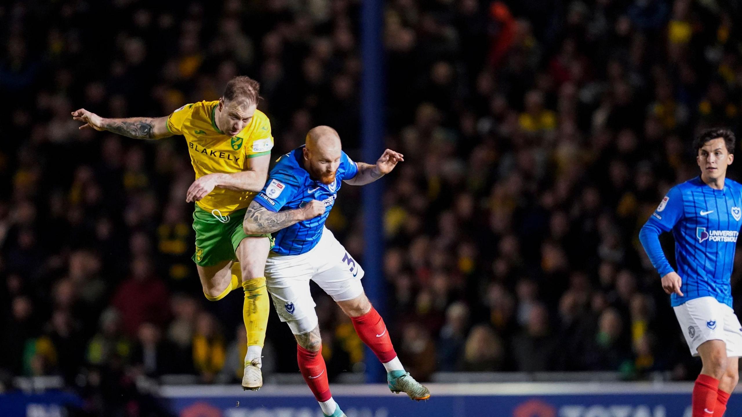 Connor Ogilvie challenges for the ball in Portsmouth's draw with Norwich