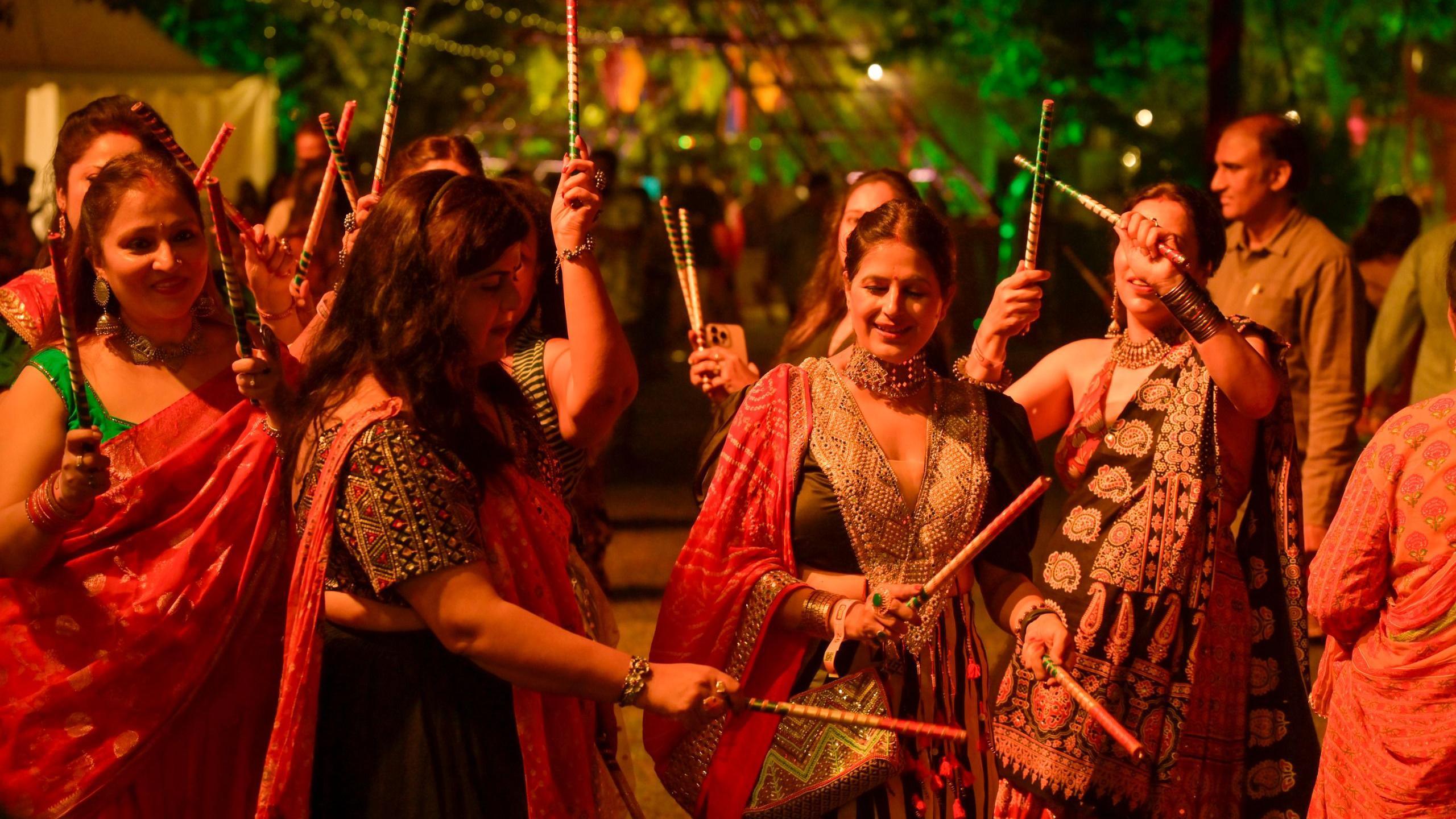 Women perform Garba and Dandiya dance during the Durga Navratri festival celebration in New Delhi, India. 