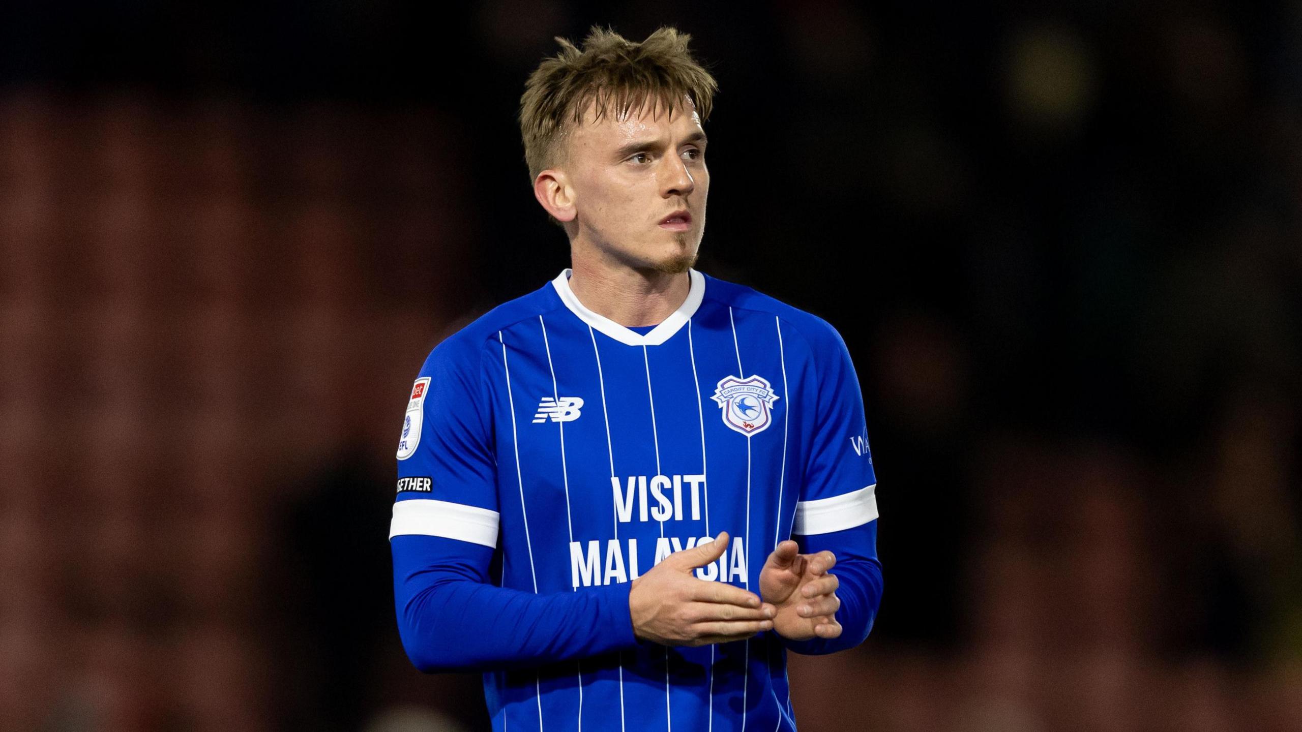 Isaak Davies applauds