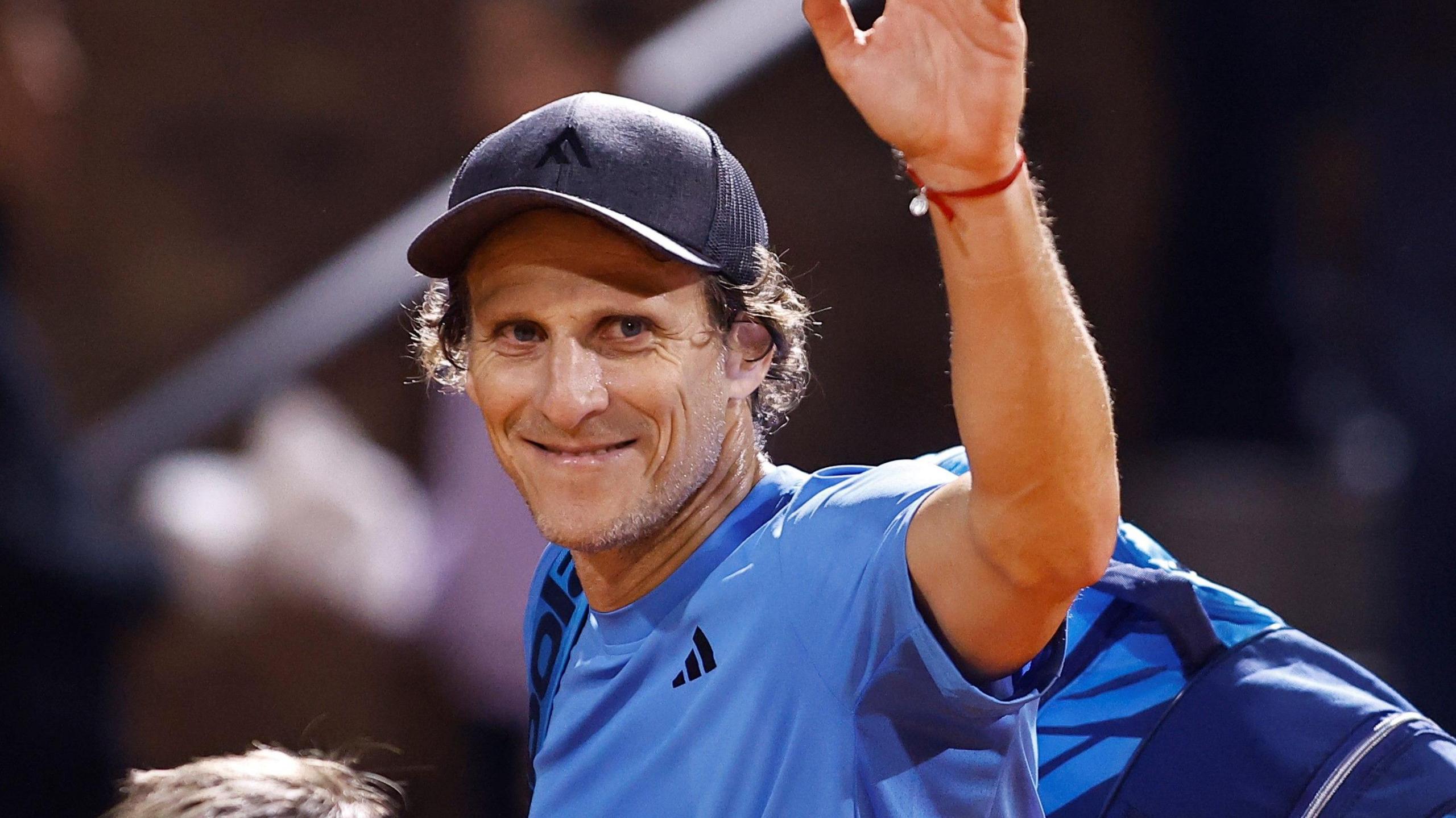 Diego Forlan waves towards the crowd