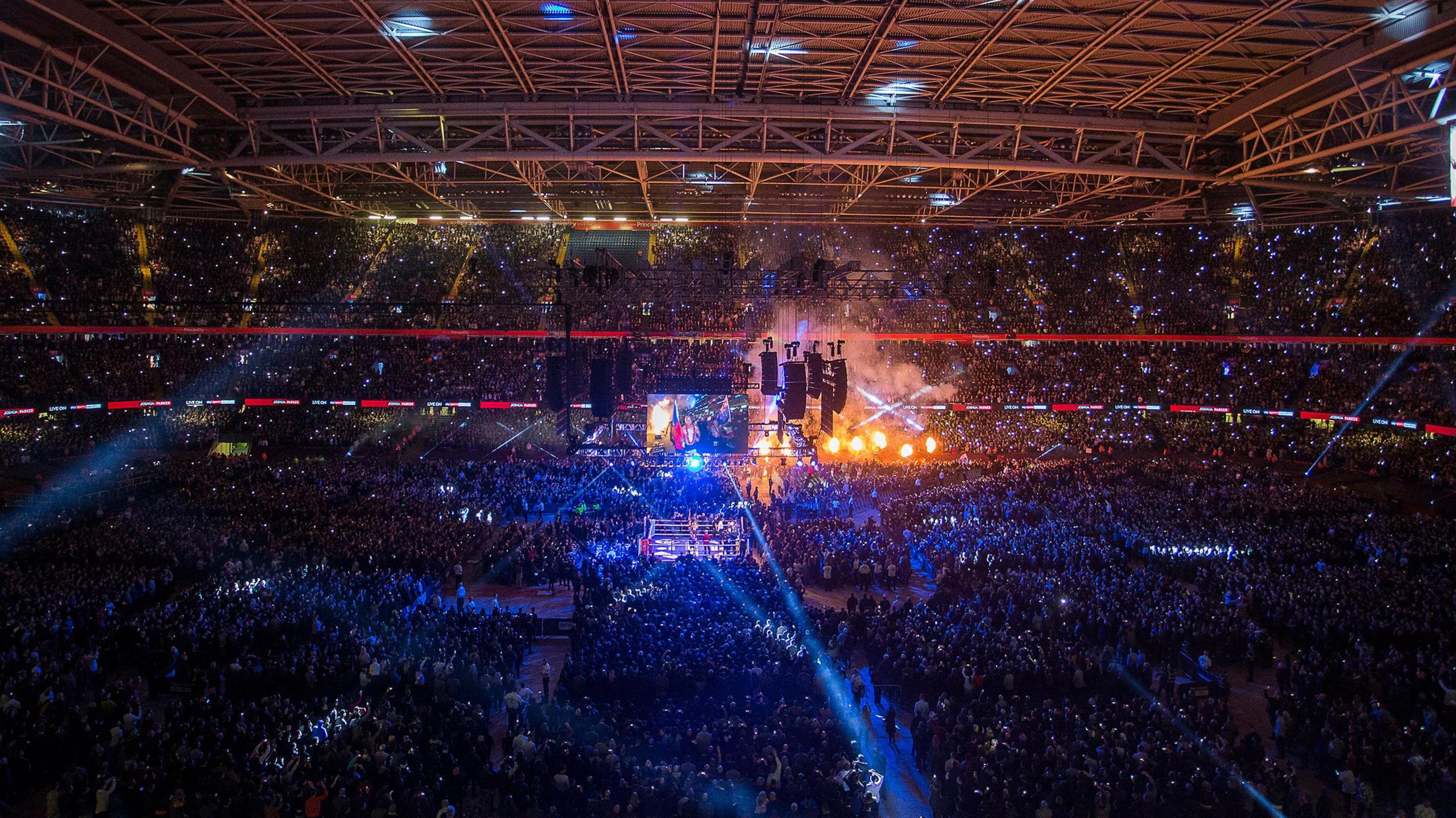 Inside view of Principality Stadium with thousands of fans around a boxing ring